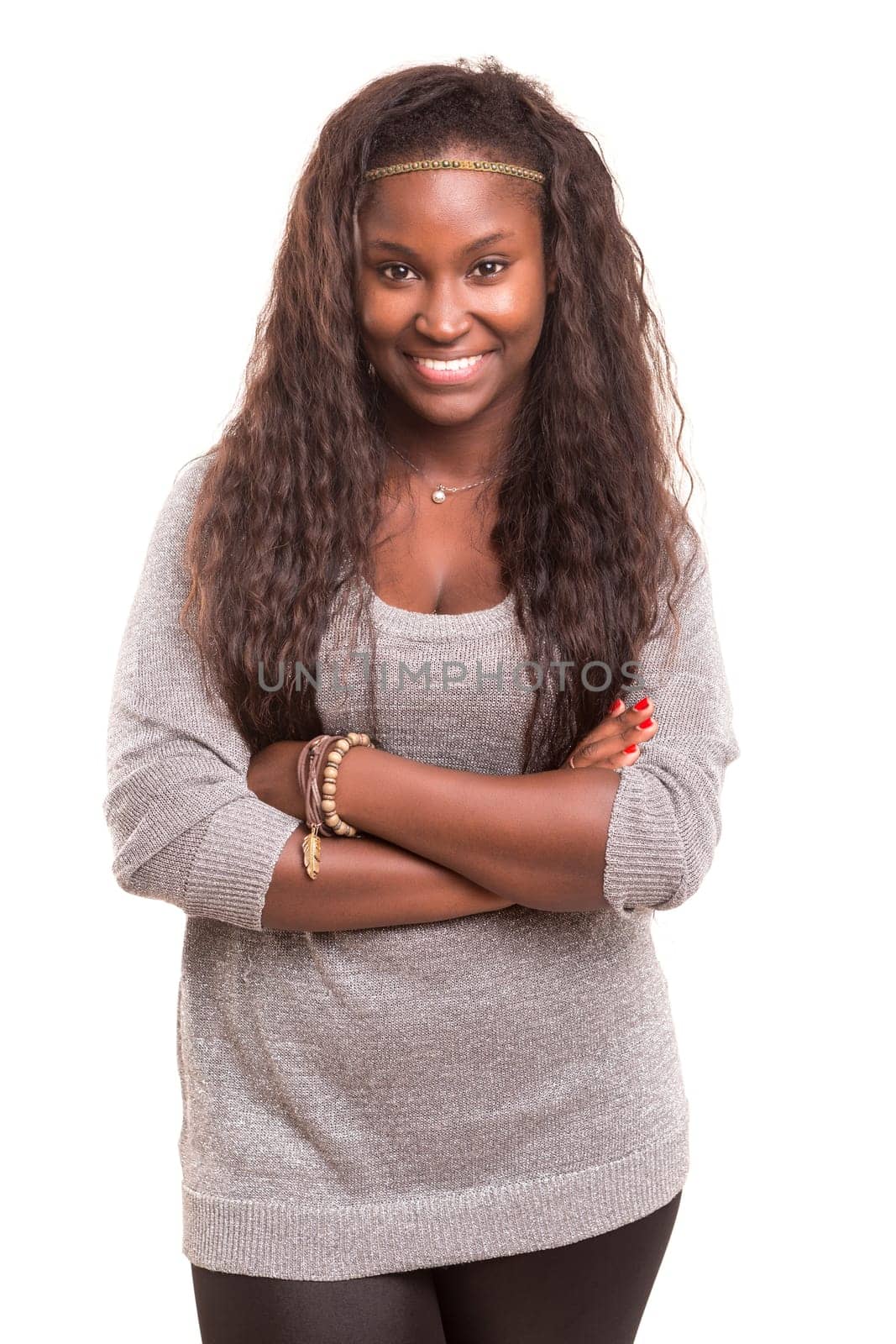 Beautiful young african woman posing isolated over white