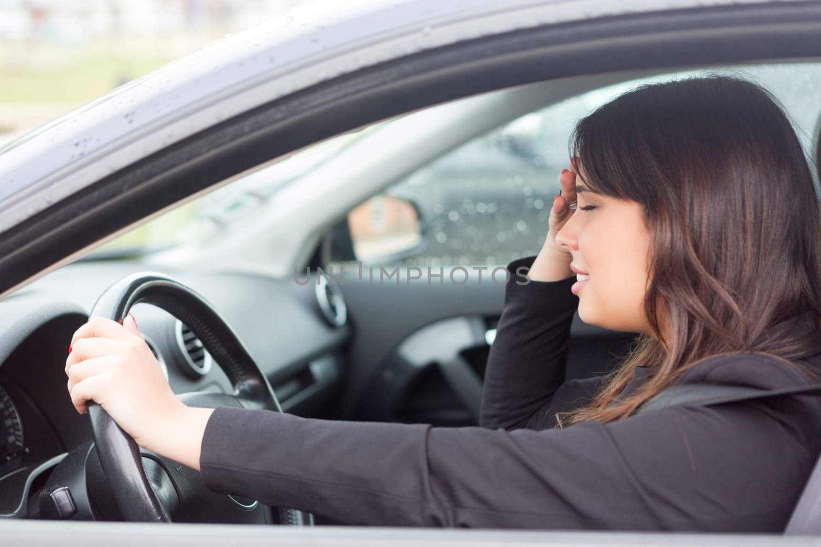 Woman in panic after having a car crash