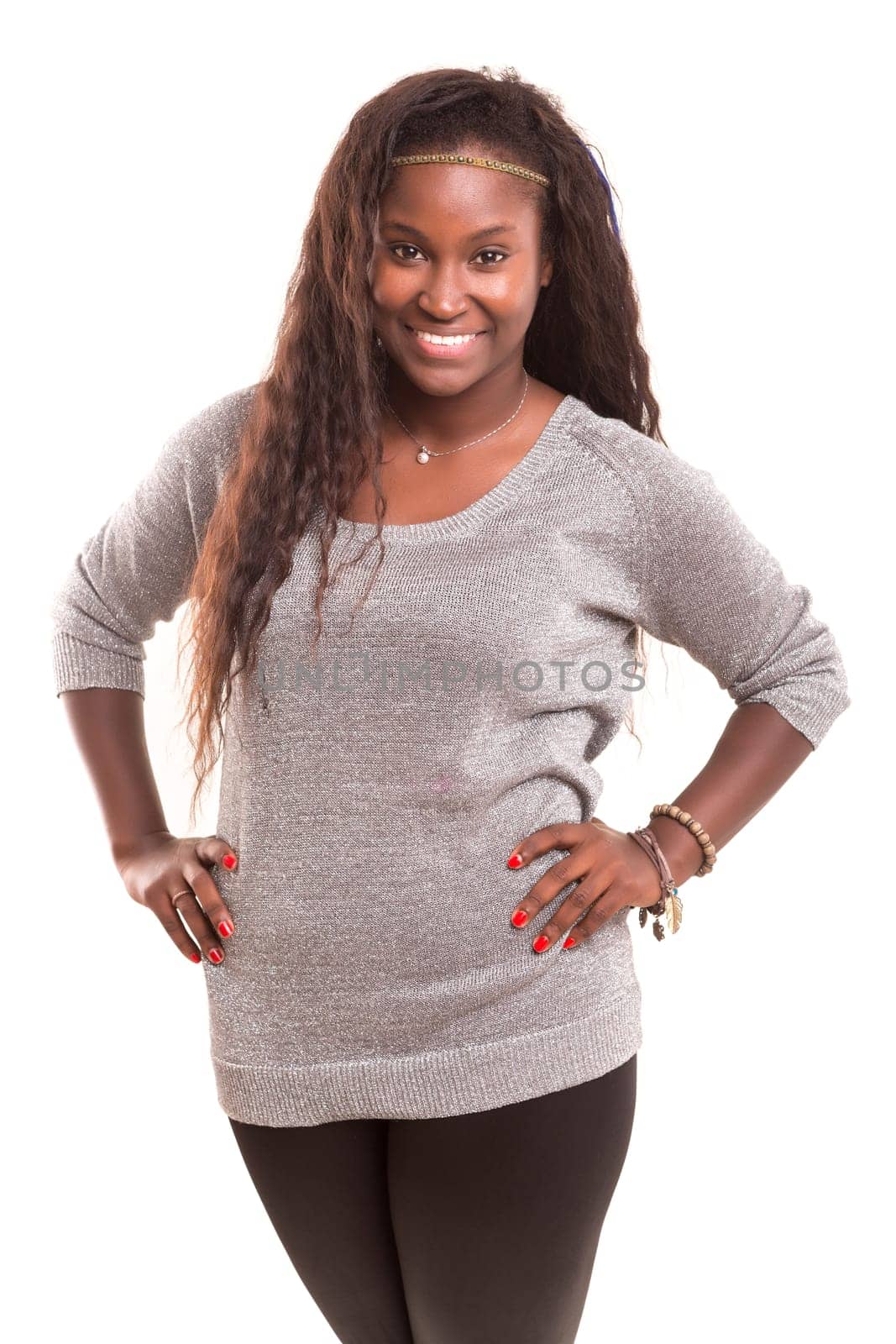 Beautiful young african woman posing isolated over white