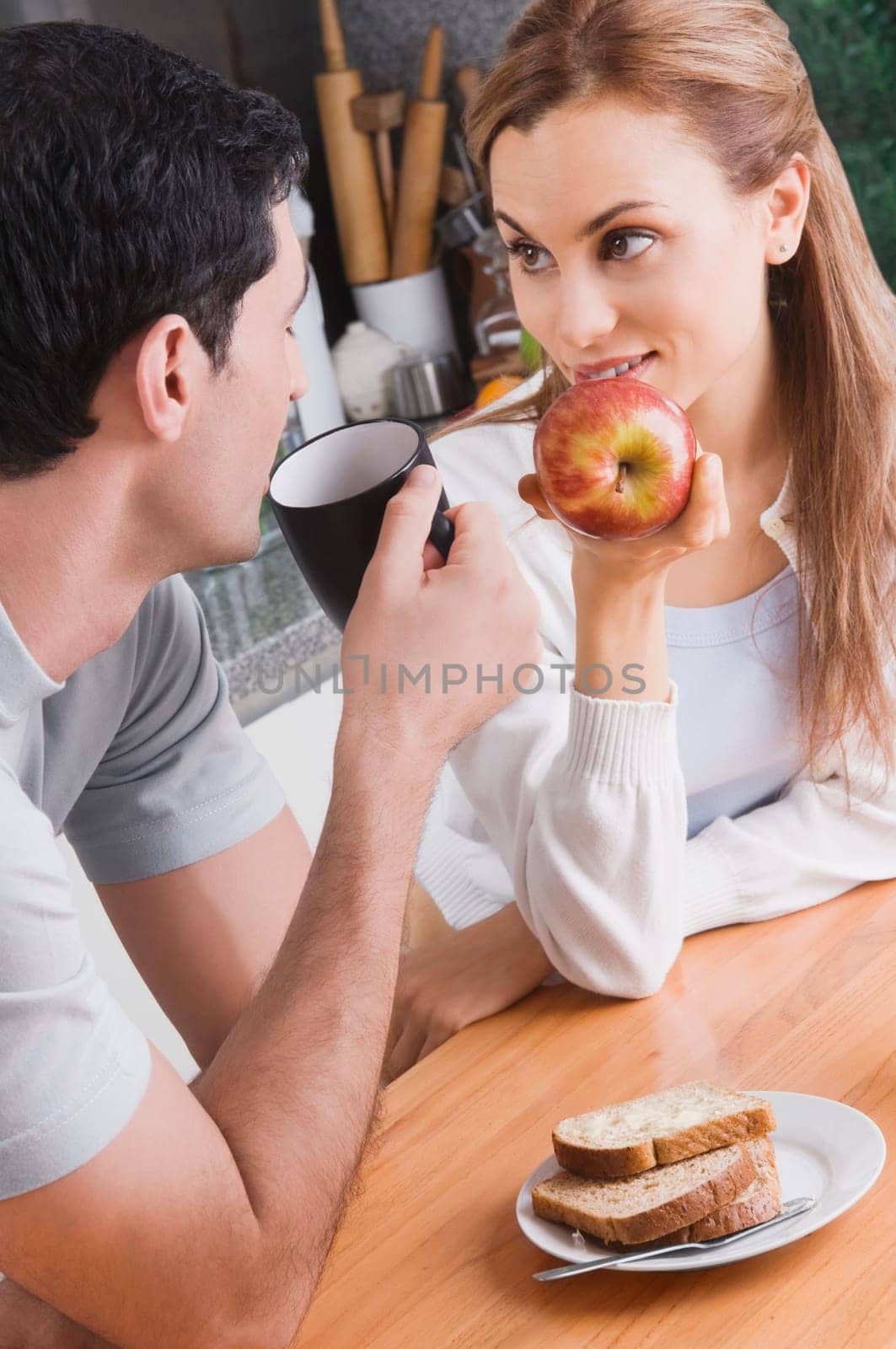 Mid adult couple having breakfast