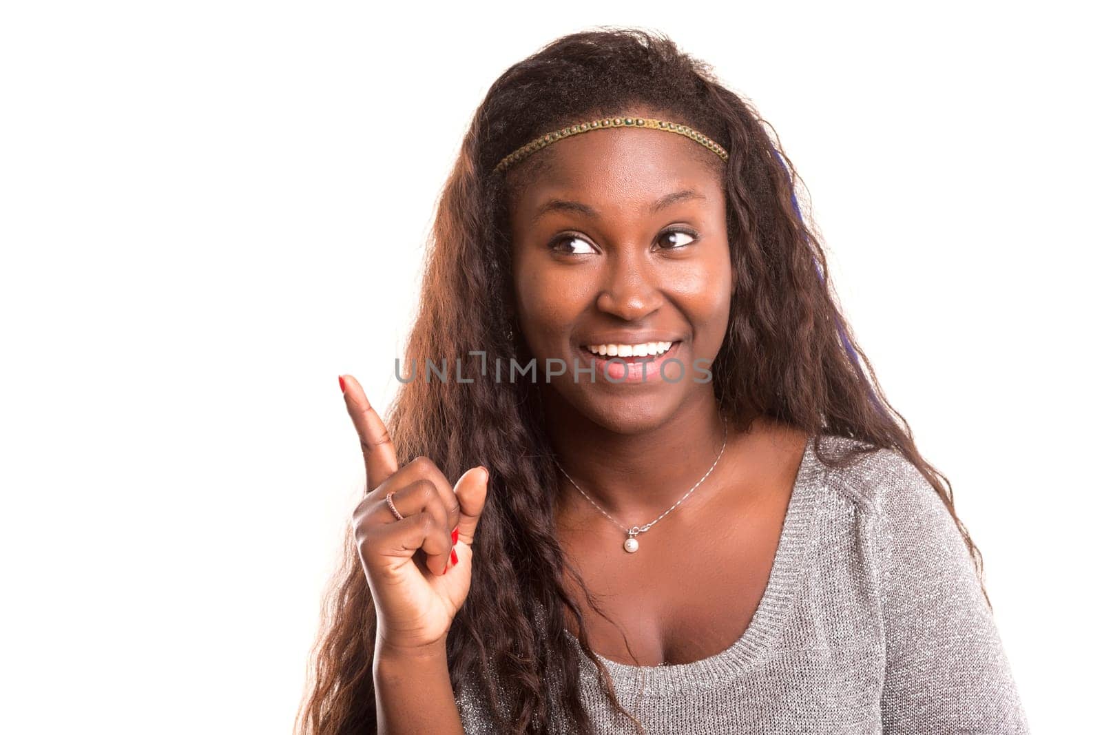 Young woman having a brilliant idea, isolated over white background