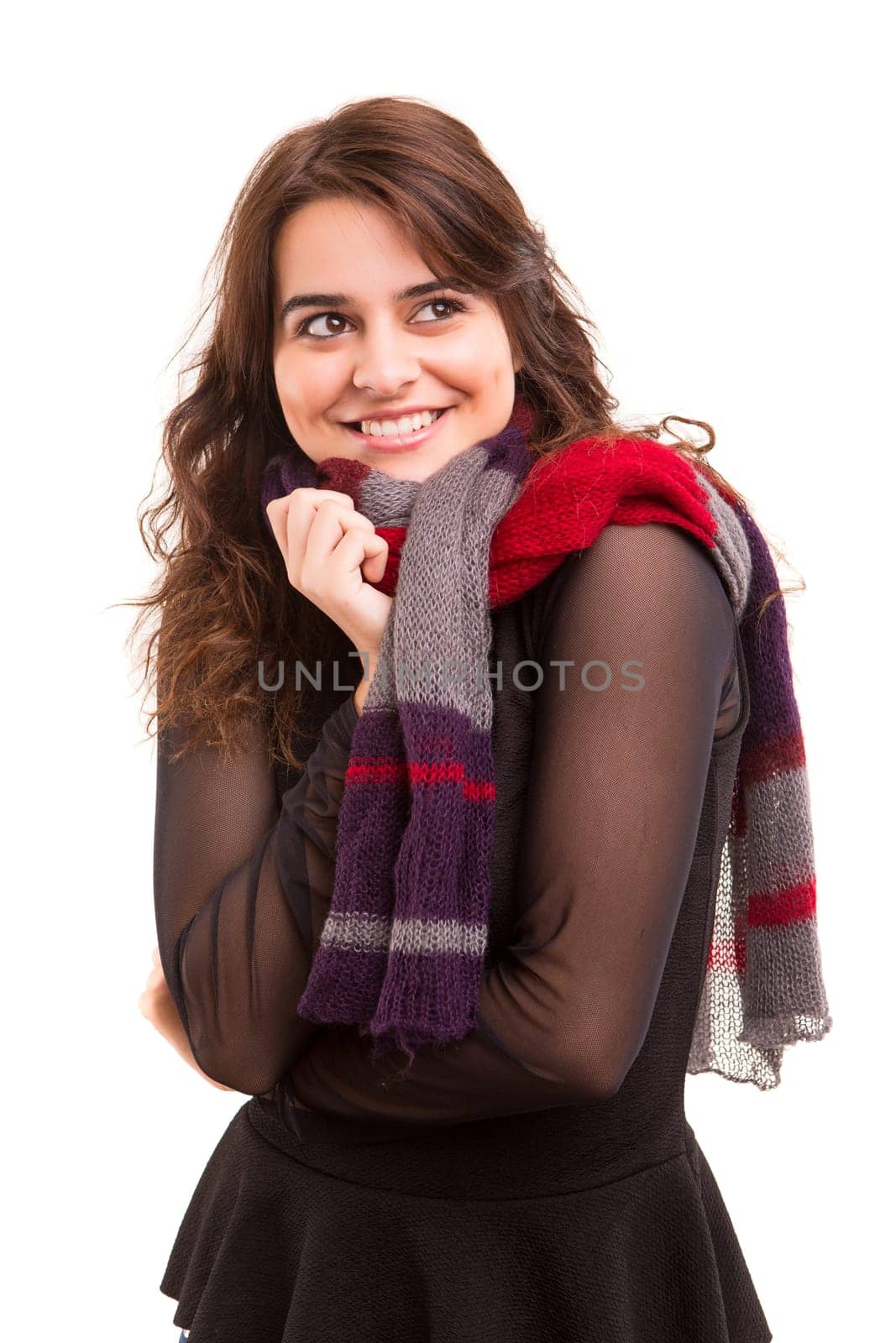 A beautiful young woman dressed with winter clothes