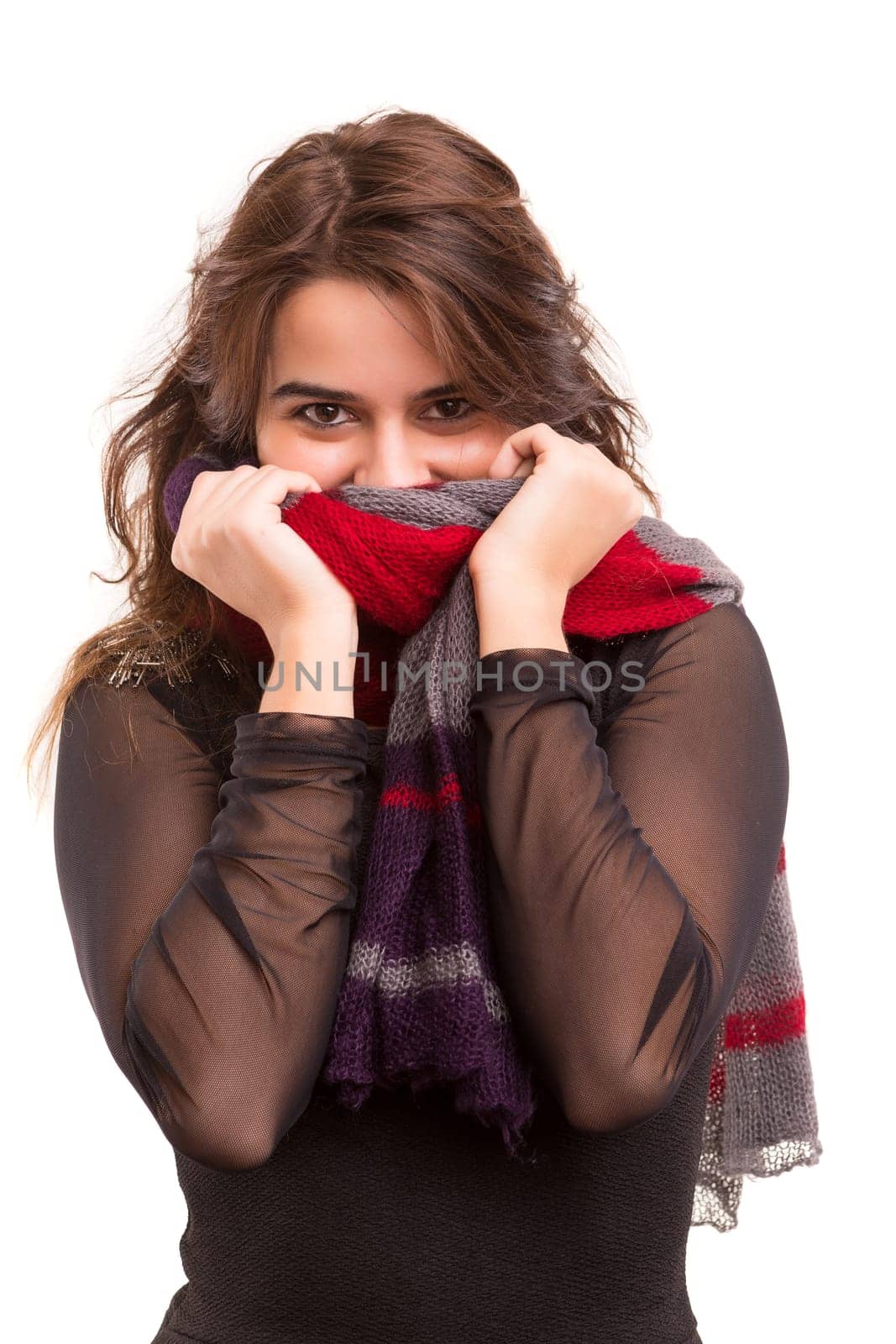 A beautiful young woman dressed with winter clothes