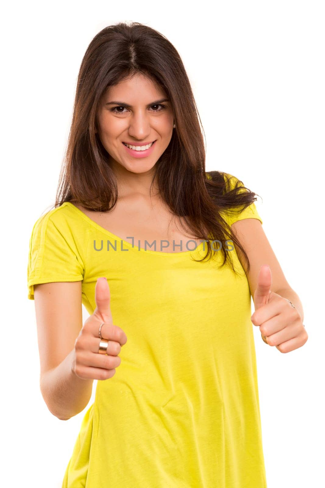 Beautiful young woman signaling ok, isolated over white