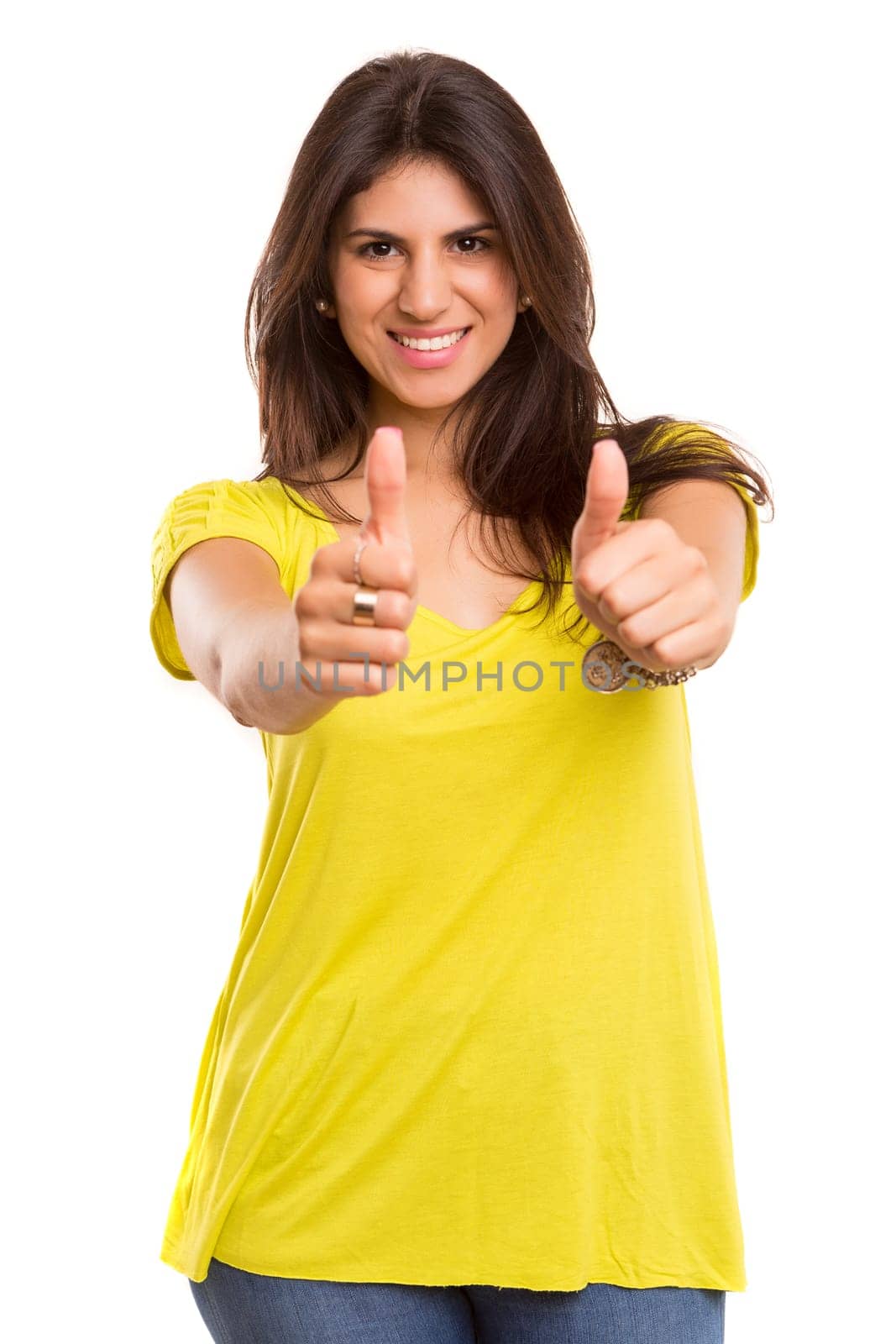 Beautiful young woman signaling ok, isolated over white