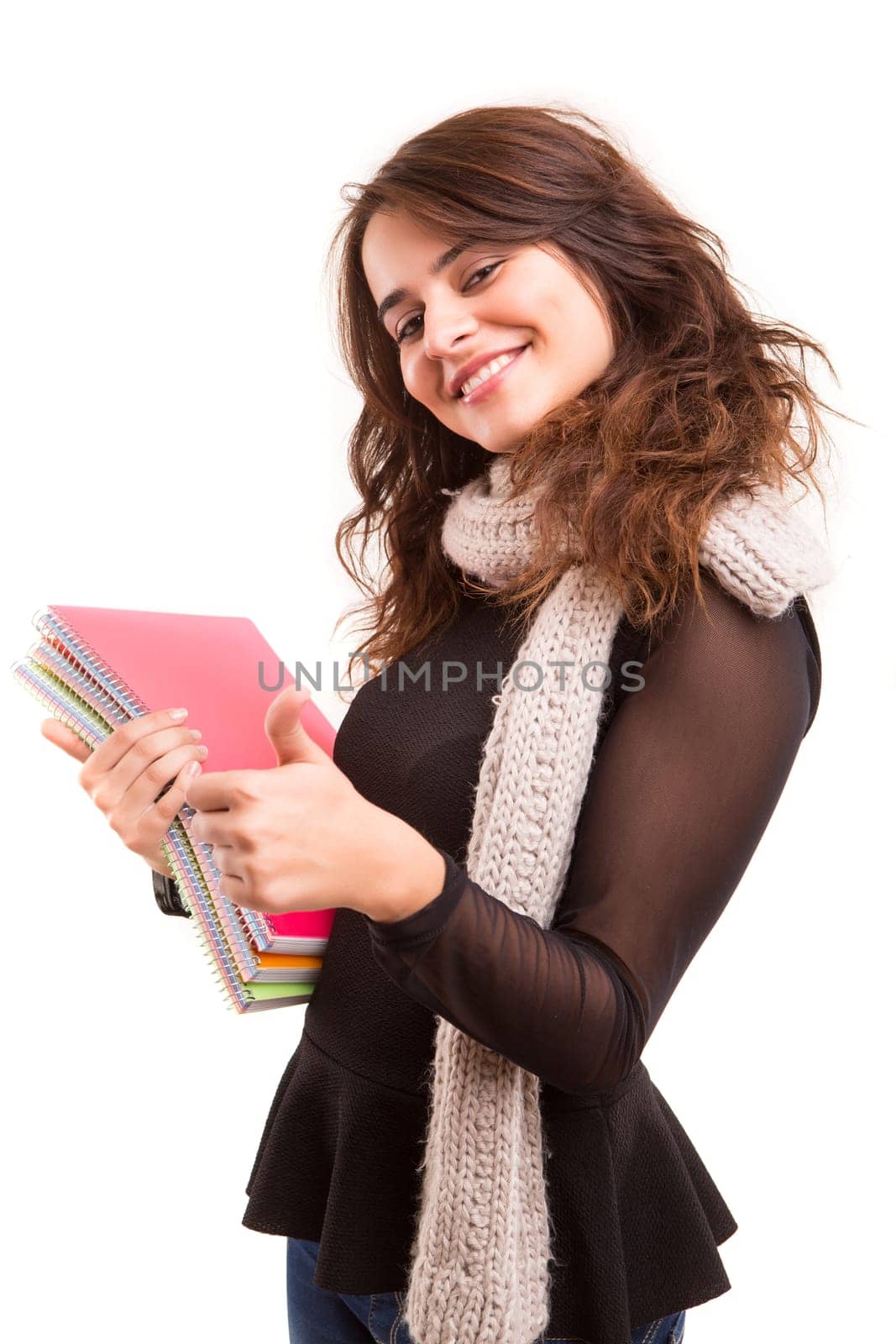 A beautiful student posing isolated over a white background