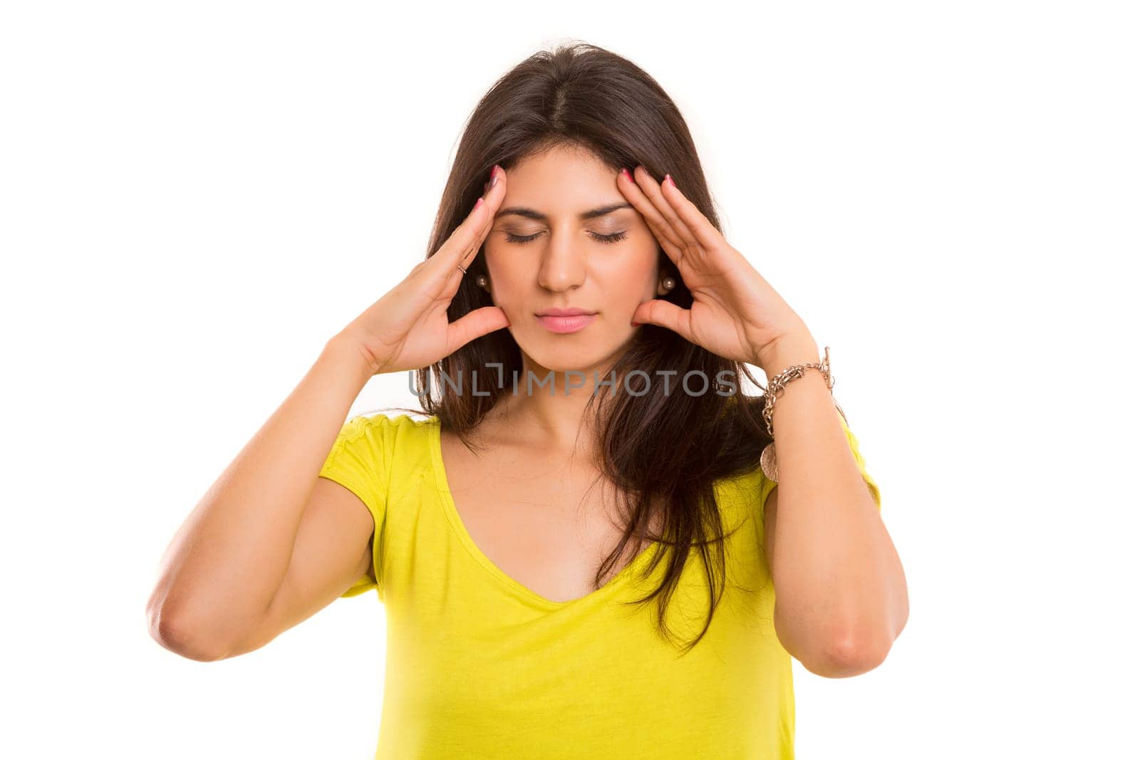 Young student tired of studying for the final exams, isolated over a white background