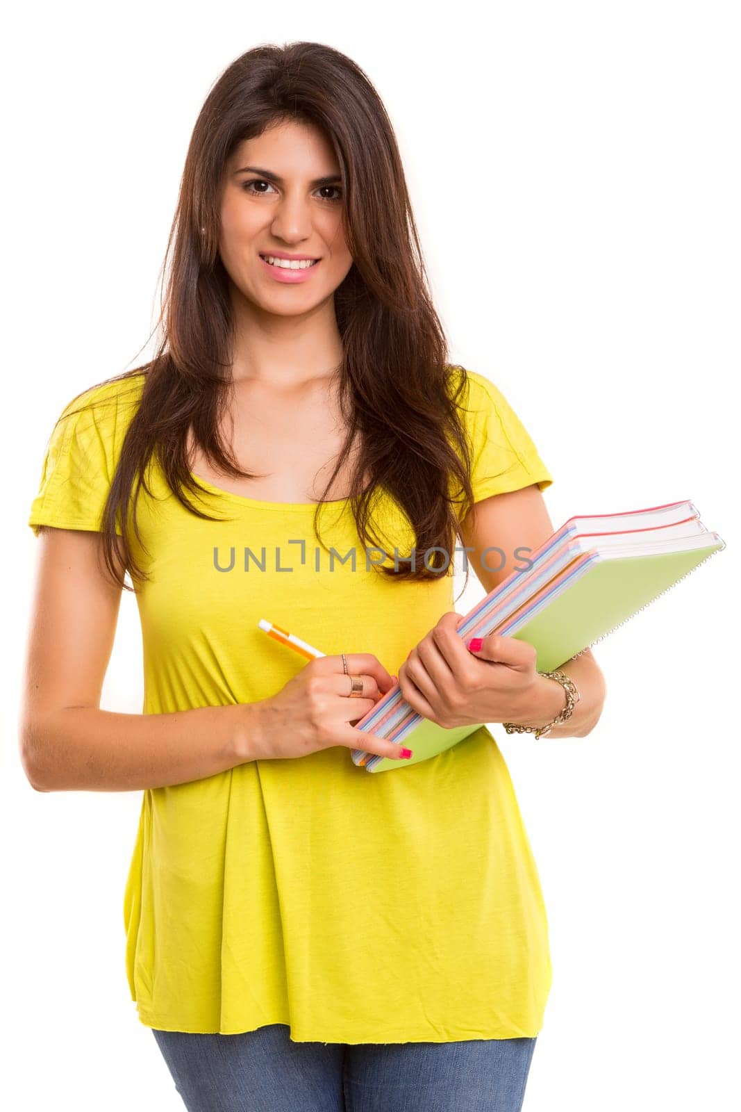 A beautiful student posing isolated over a white background