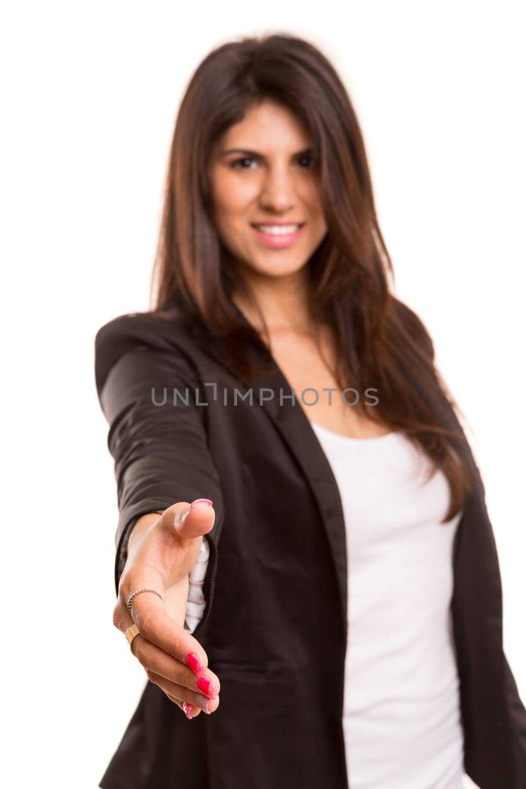Young business woman offering handshake, isolated over copy space background