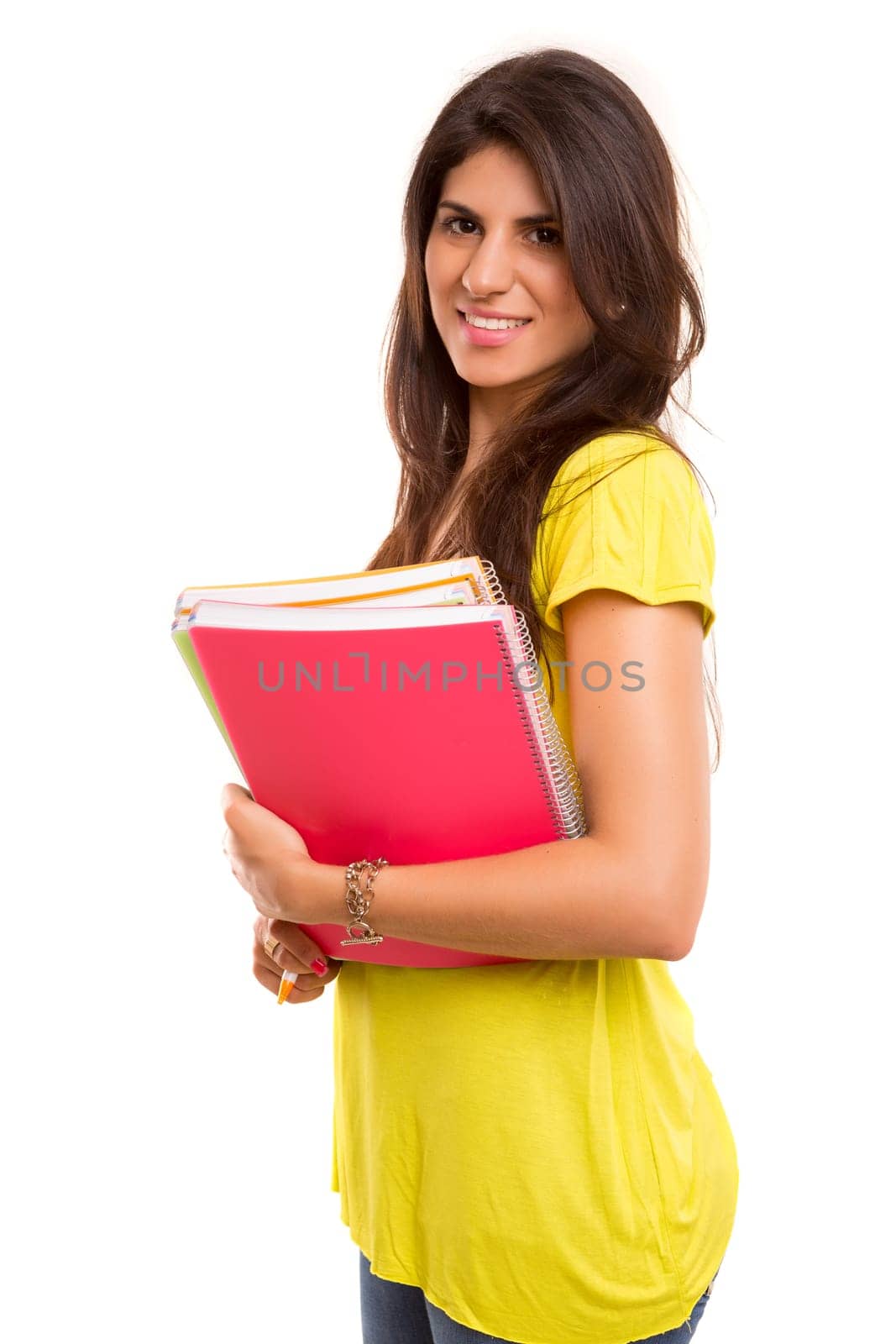A beautiful student posing isolated over a white background