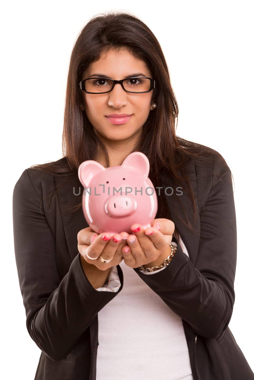 Young woman holding a piggy bank (money box) - savings concept
