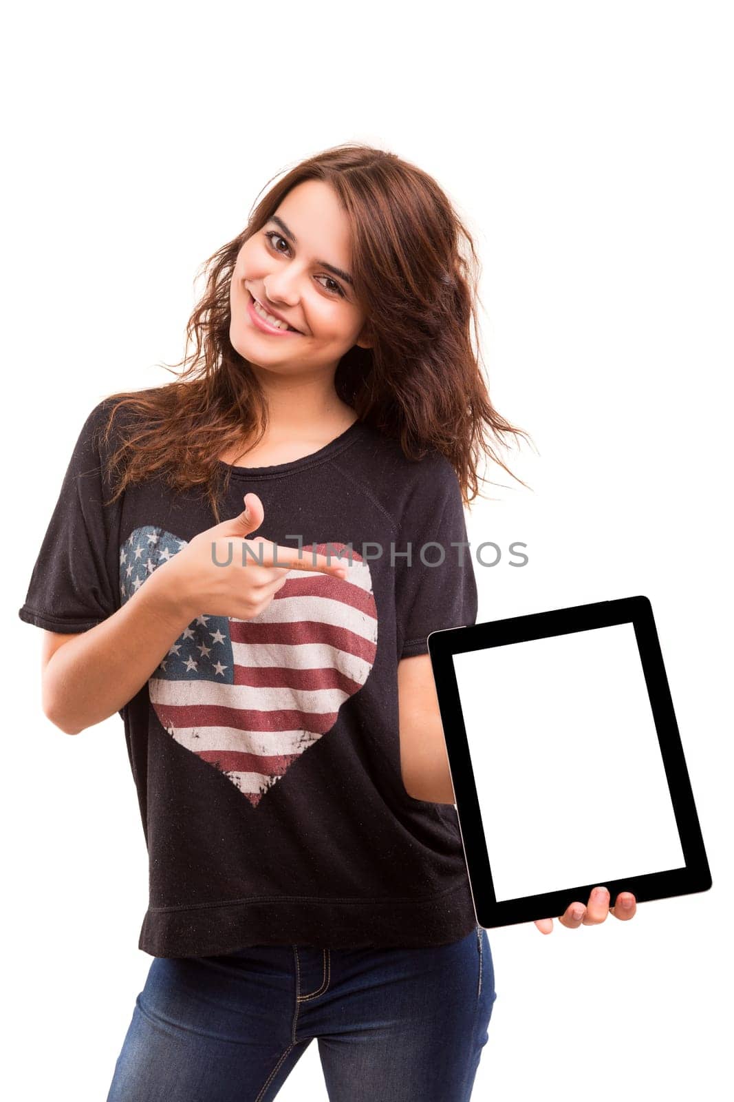 Happy young woman presenting your product in a tablet computer