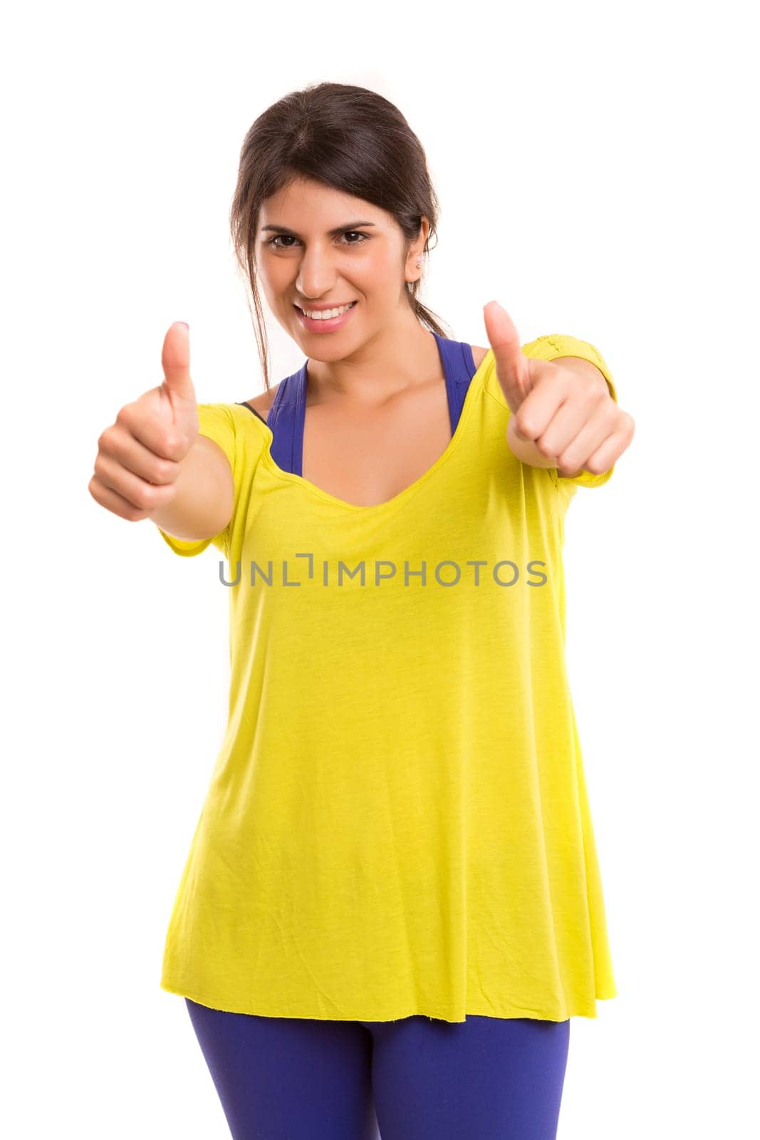 A beautiful young woman in great shape - fitness concept