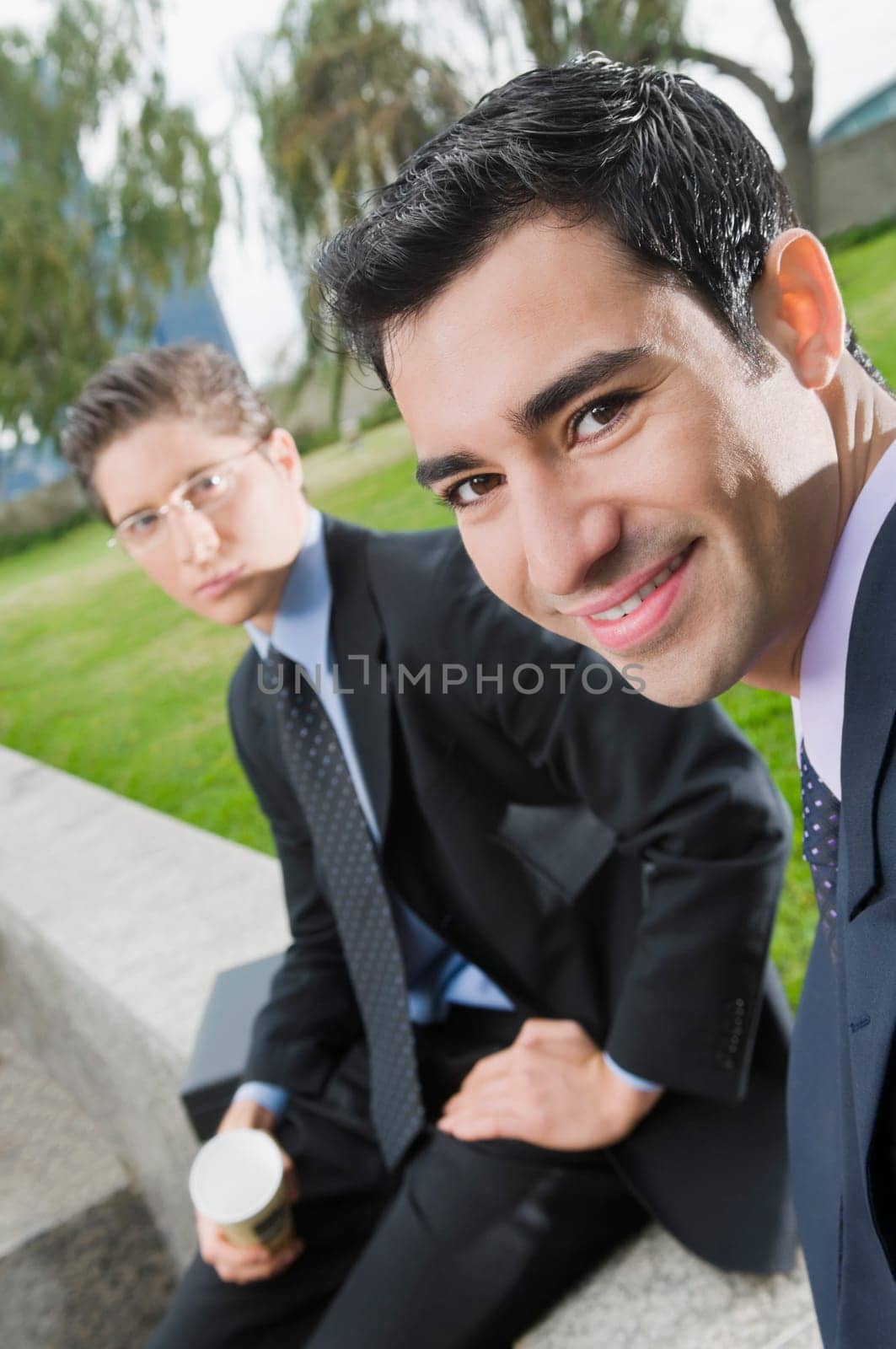 Portrait of two businessmen smiling