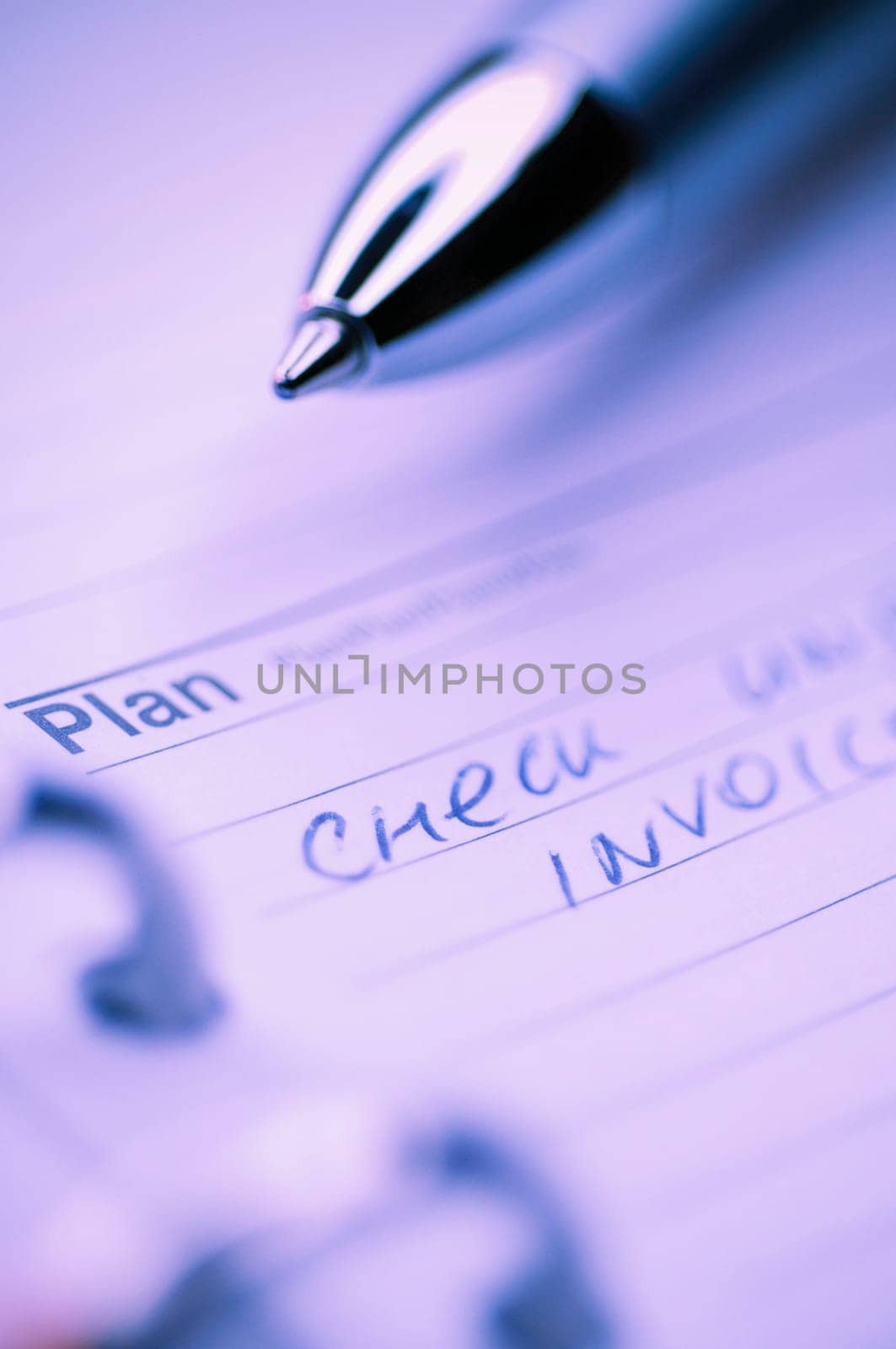 Close_up of a pen on a personal organizer