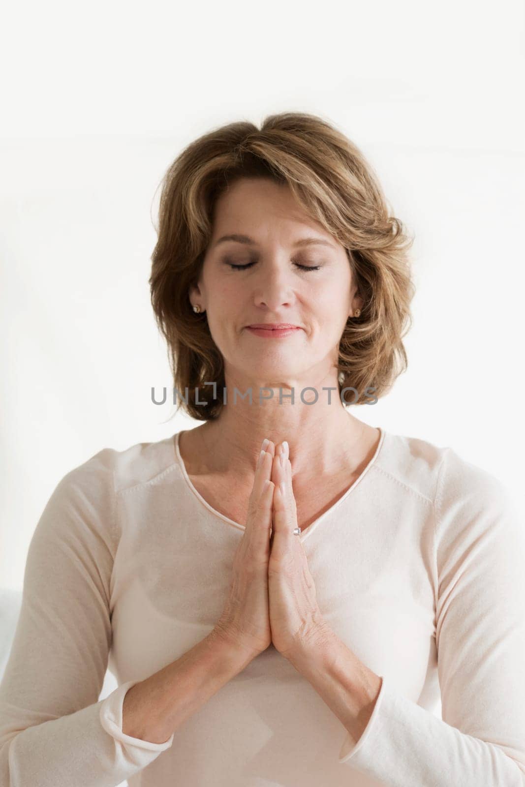 Woman in a prayer position