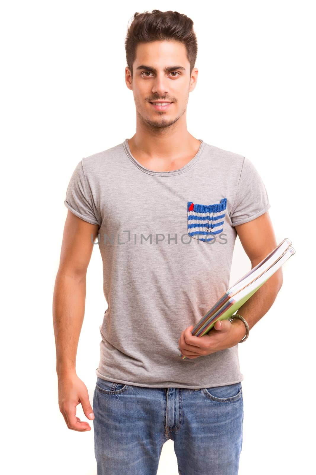 Young happy student posing isolated over white background