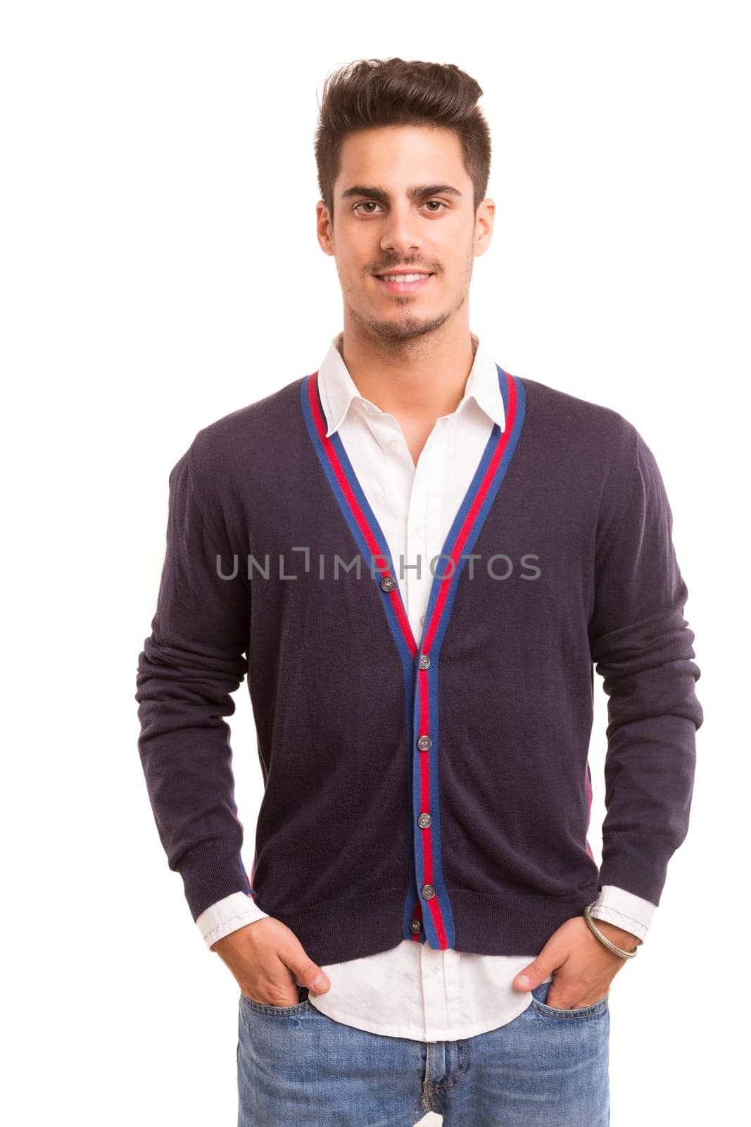 Studio picture of a young and handsome man posing isolated