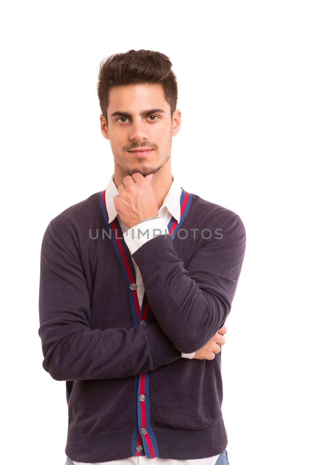 Studio picture of a young and handsome man posing isolated