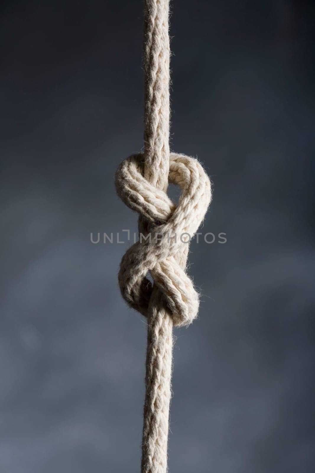 Close_up of ropes with reef knot