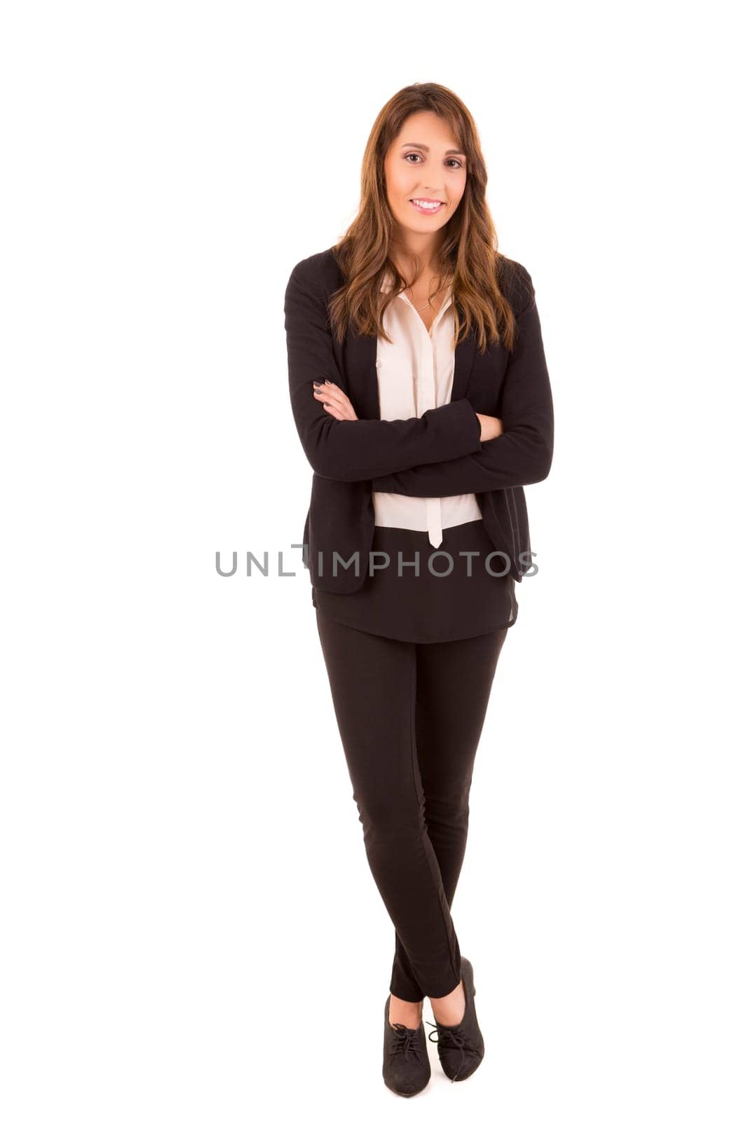 Beautiful young business woman posing isolated over white