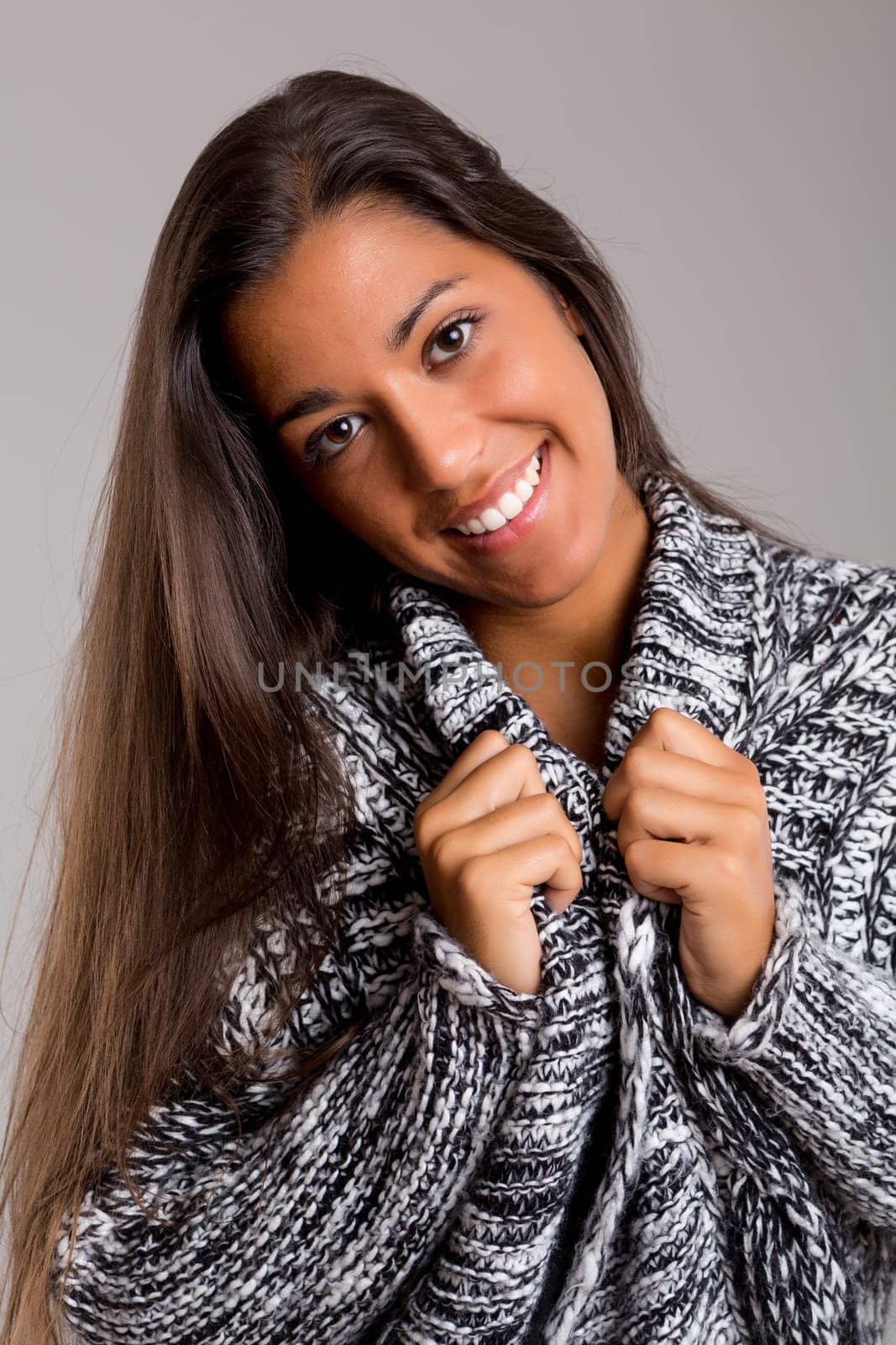A beautiful young woman posing isolated