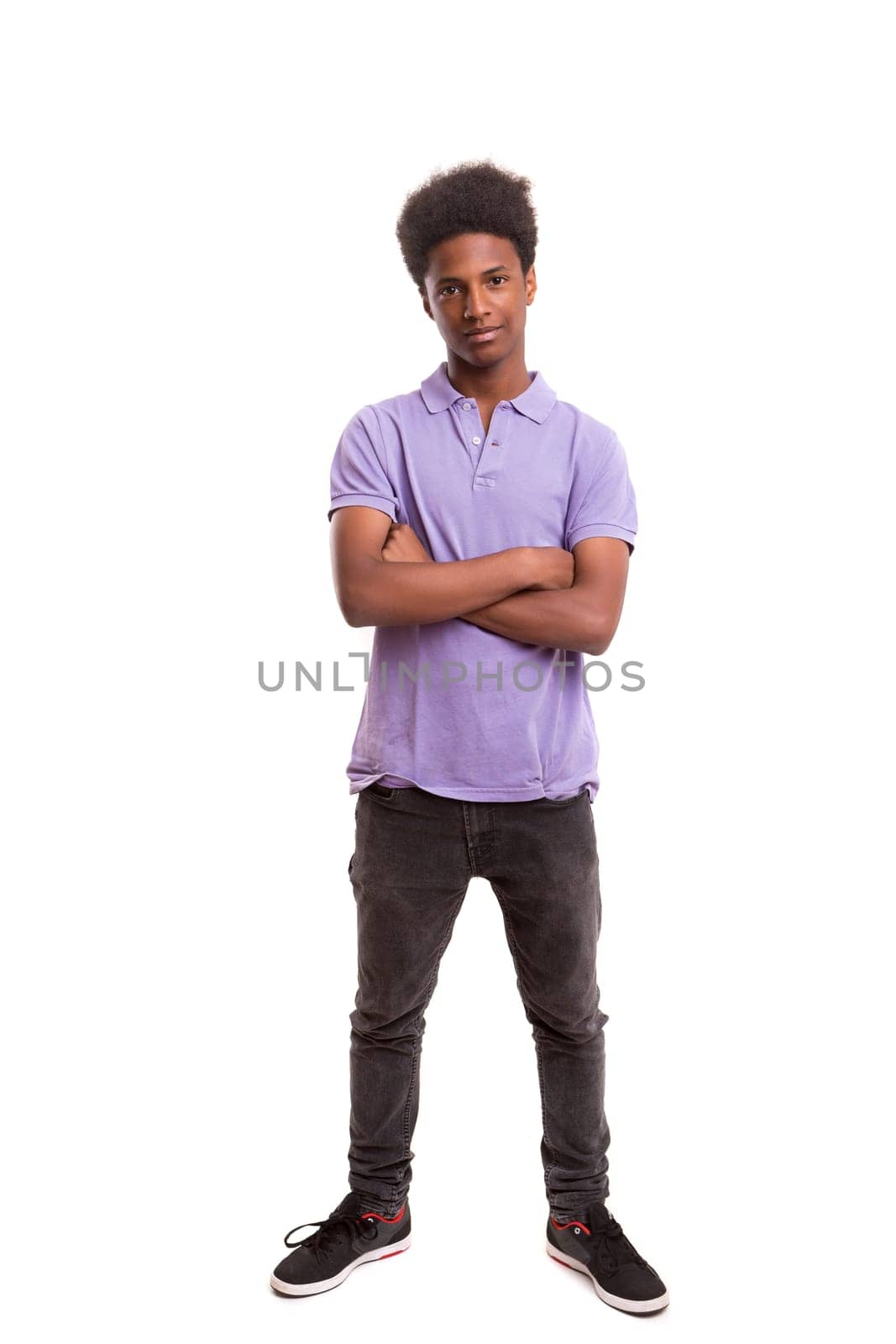 A casual young black boy posing isolated