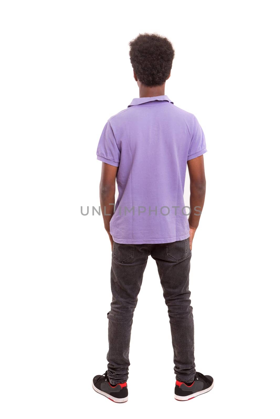 A casual young black boy posing isolated
