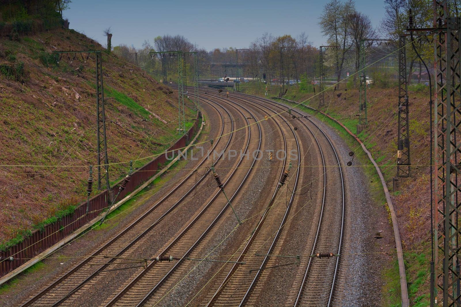 View from a bridge on railroad tracks
