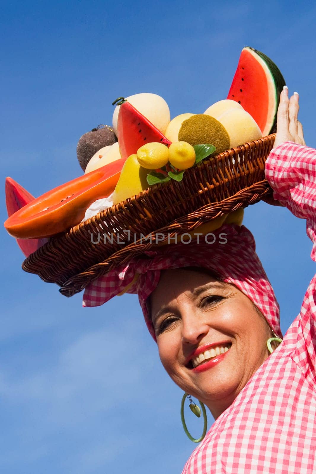 Portrait of a mature woman selling fruits