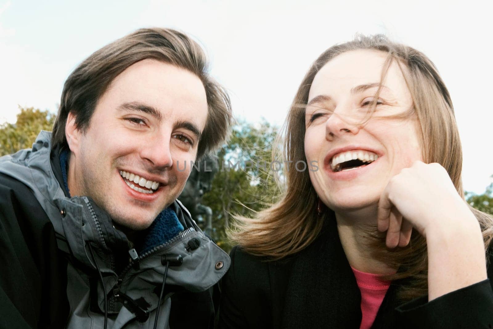 Close_up of a young couple smiling