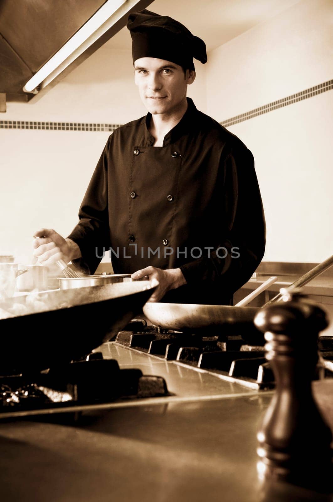 Chef cooking food in the kitchen