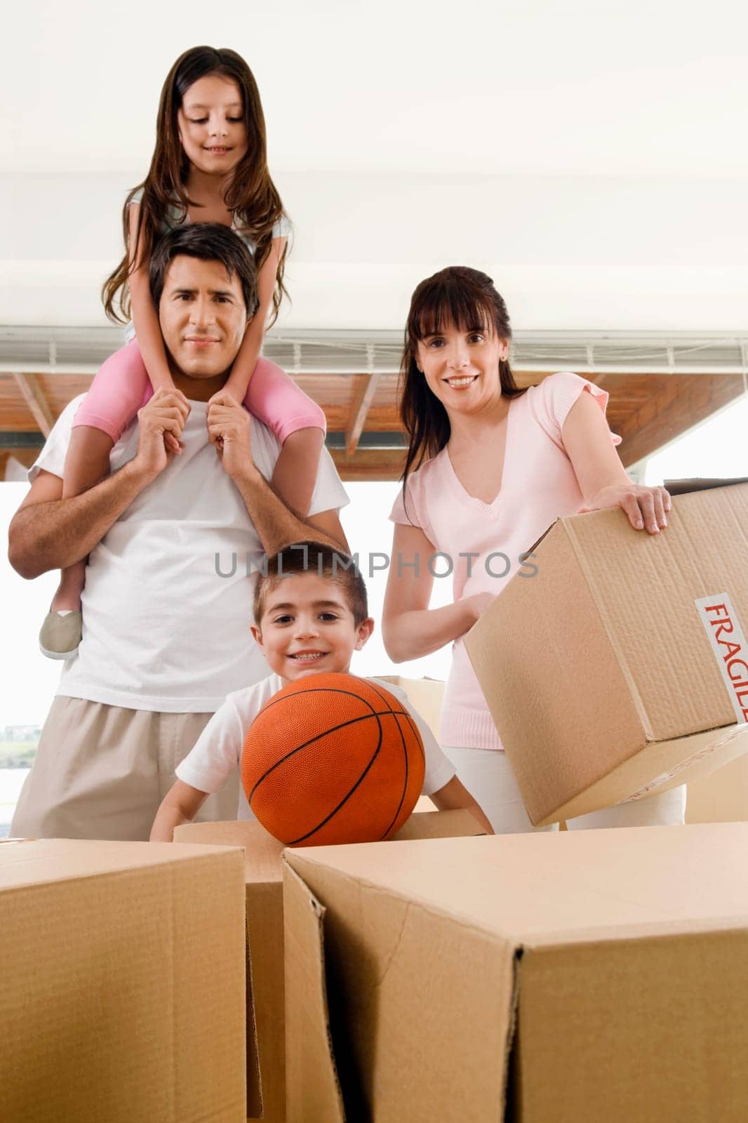 Portrait of a family standing together and smiling