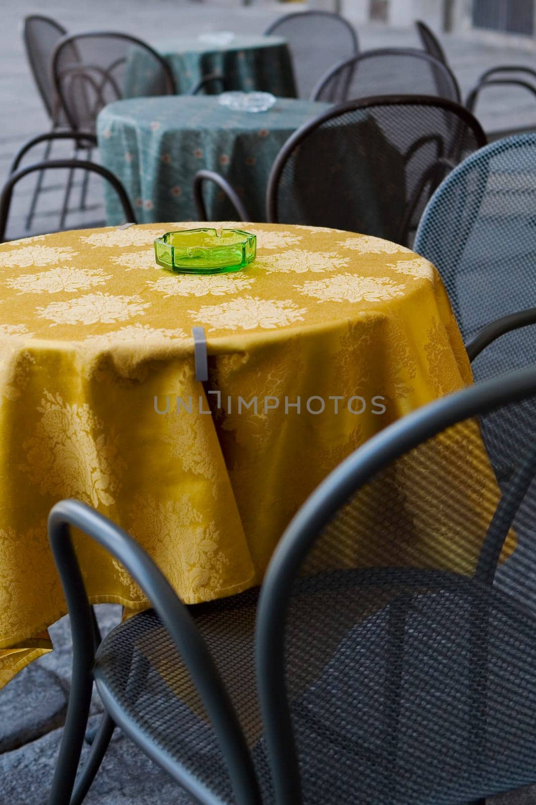 Tables and chairs in a sidewalk cafe, Naples, Naples Province, Campania, Italy