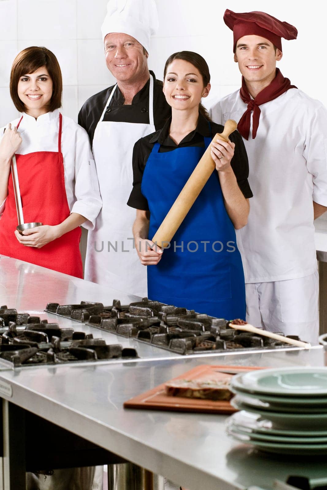 Chefs standing in the kitchen