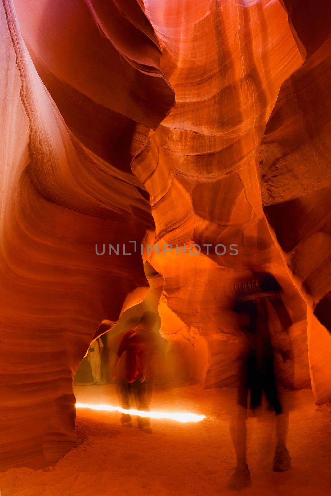 Tourists walking in a canyon, Antelope Canyon, Page, Arizona, USA