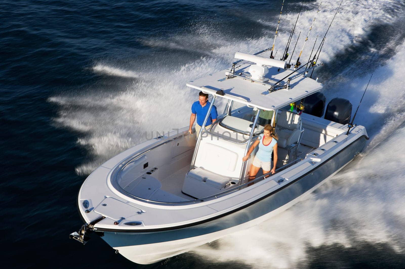 High angle view of tourists on a speedboat