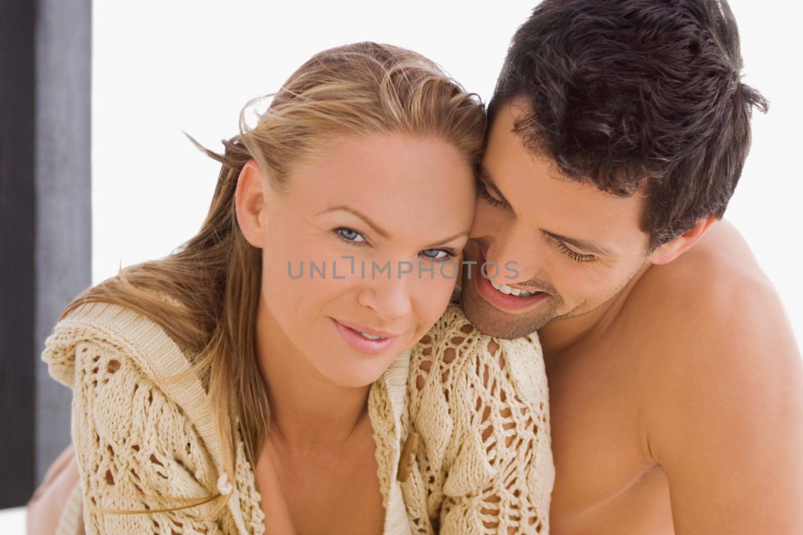 Close_up of a mid adult couple romancing