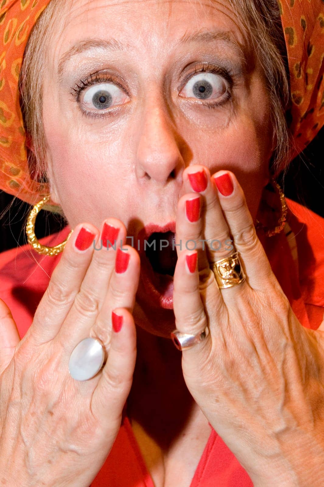 Portrait of a mature woman looking shocked