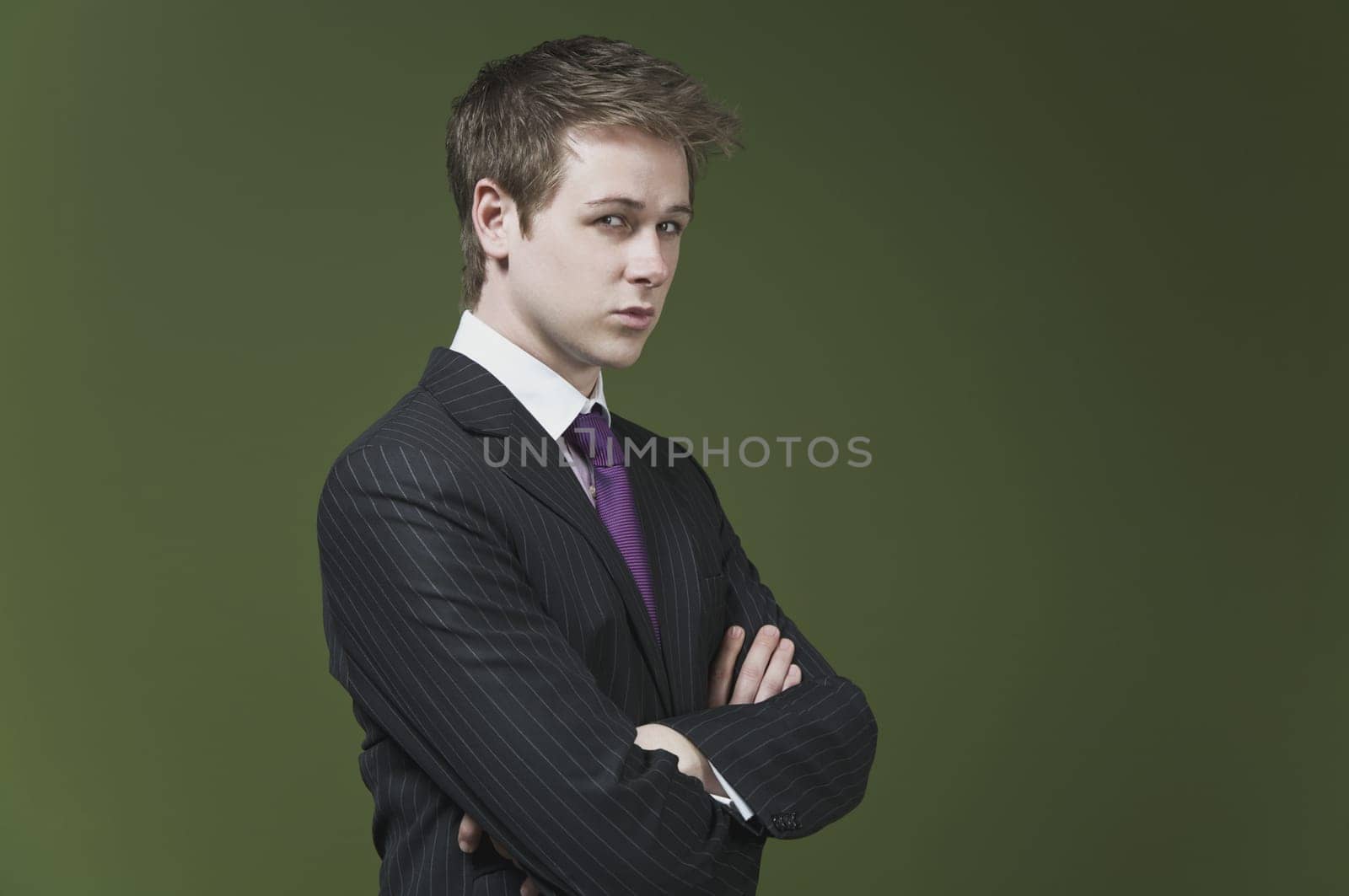 Portrait of a businessman with his arms crossed