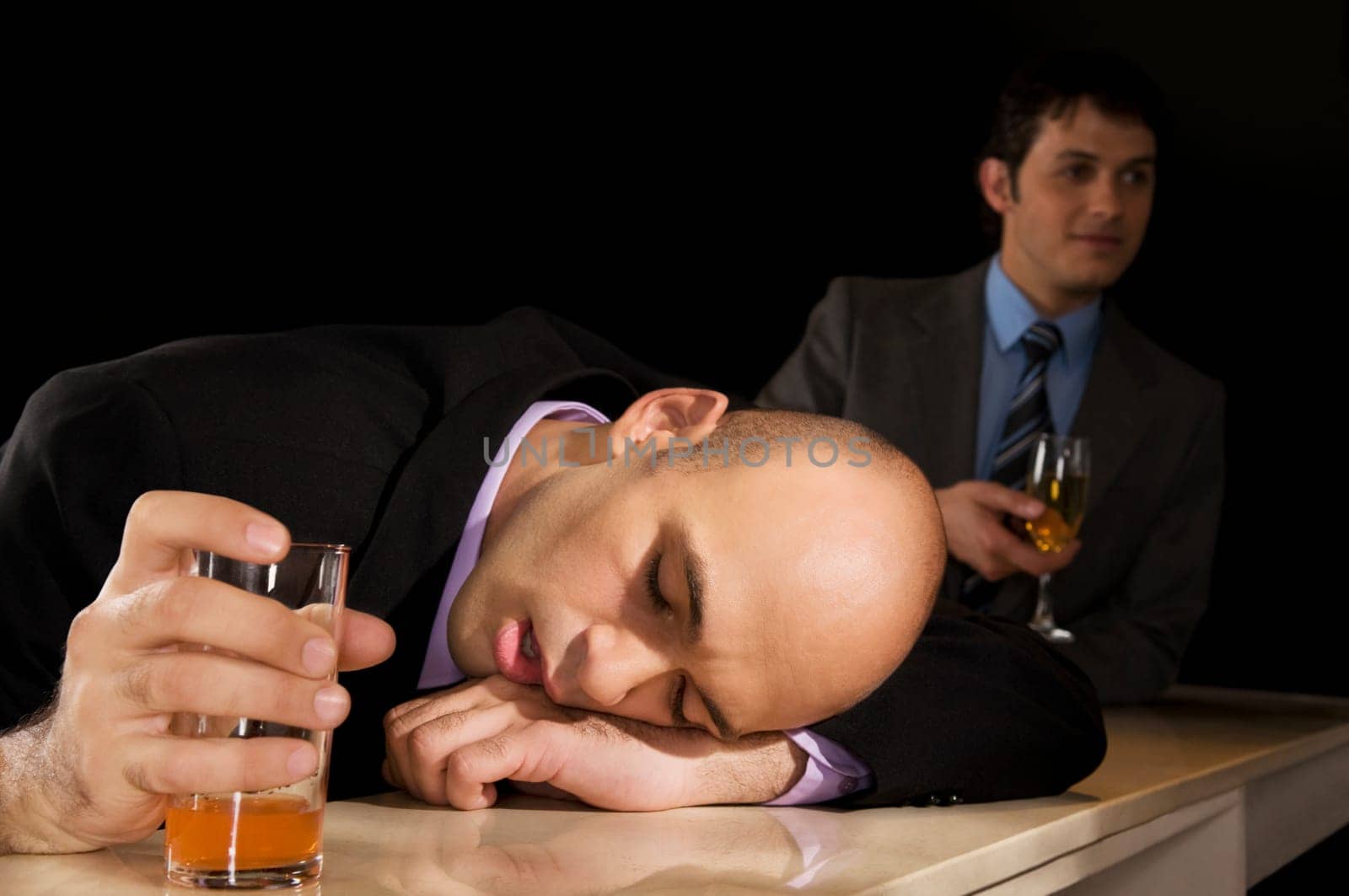 Businessmen in a bar