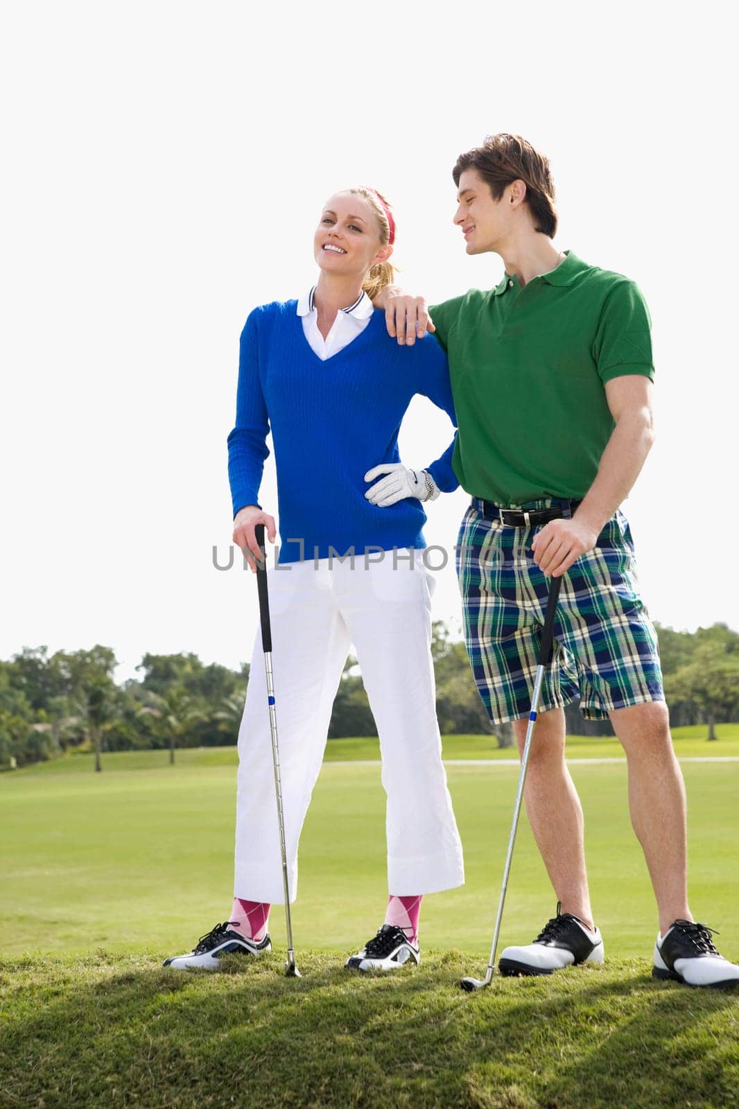 Couple standing in a golf course, Biltmore Golf Course, Coral Gables, Florida, USA