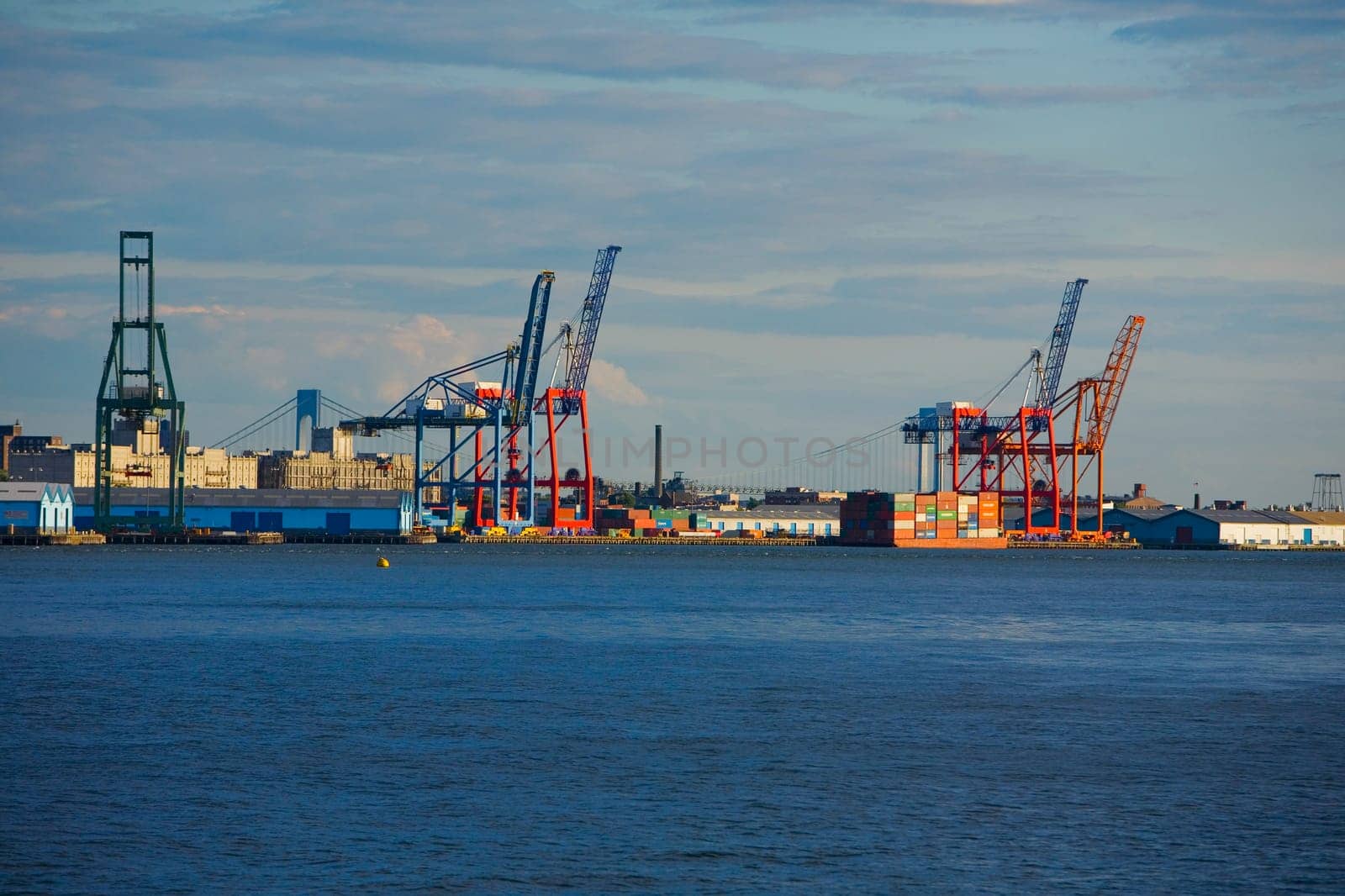 Cranes and cargo containers at a commercial dock, Hudson River, Brooklyn, New York City, New York State, USA