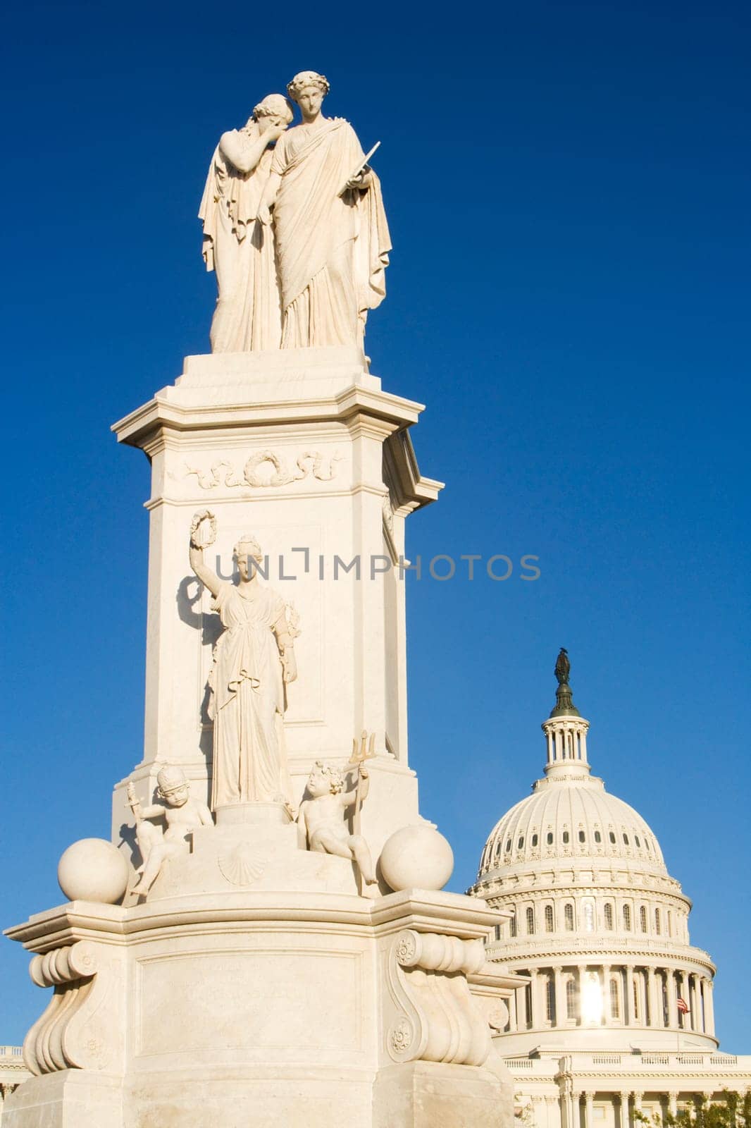 Low angle view of statues in front of a government building, State Capitol Building, The Mall, Washington DC, USA