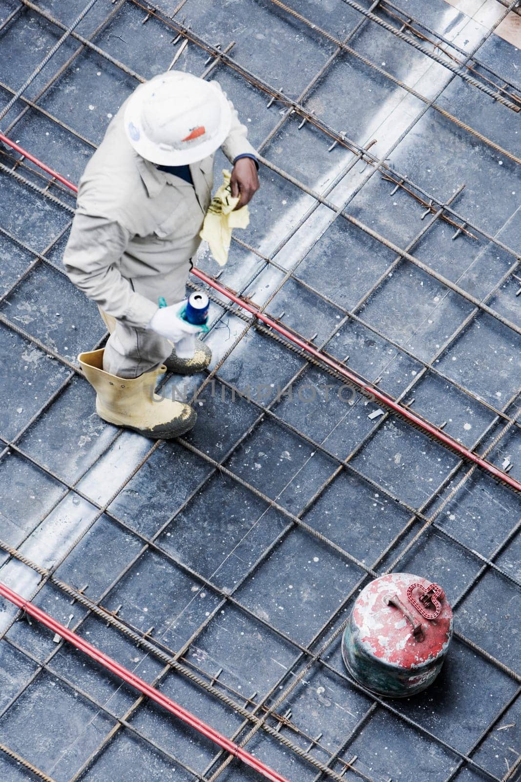 High angle view of a construction worker standing at a construction site