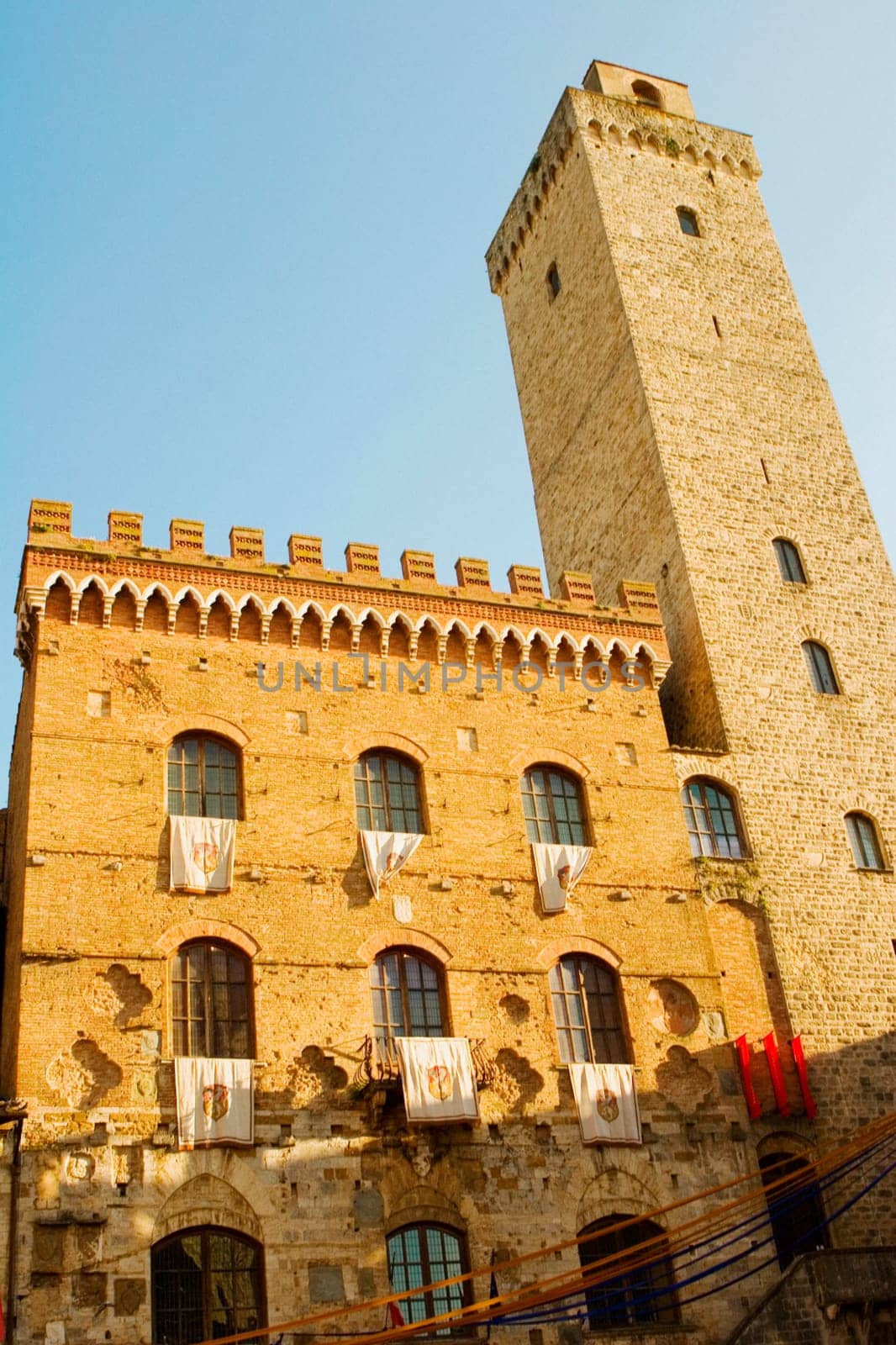 Low angle view of a building, Palazzo Del Podesta, La Rognosa, San Gimignano, Siena Province, Tuscany, Italy