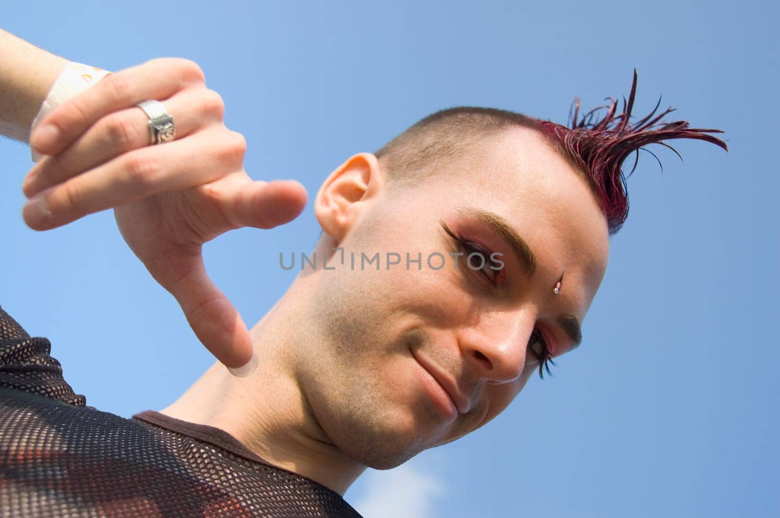 Low angle view of a gay man gesturing