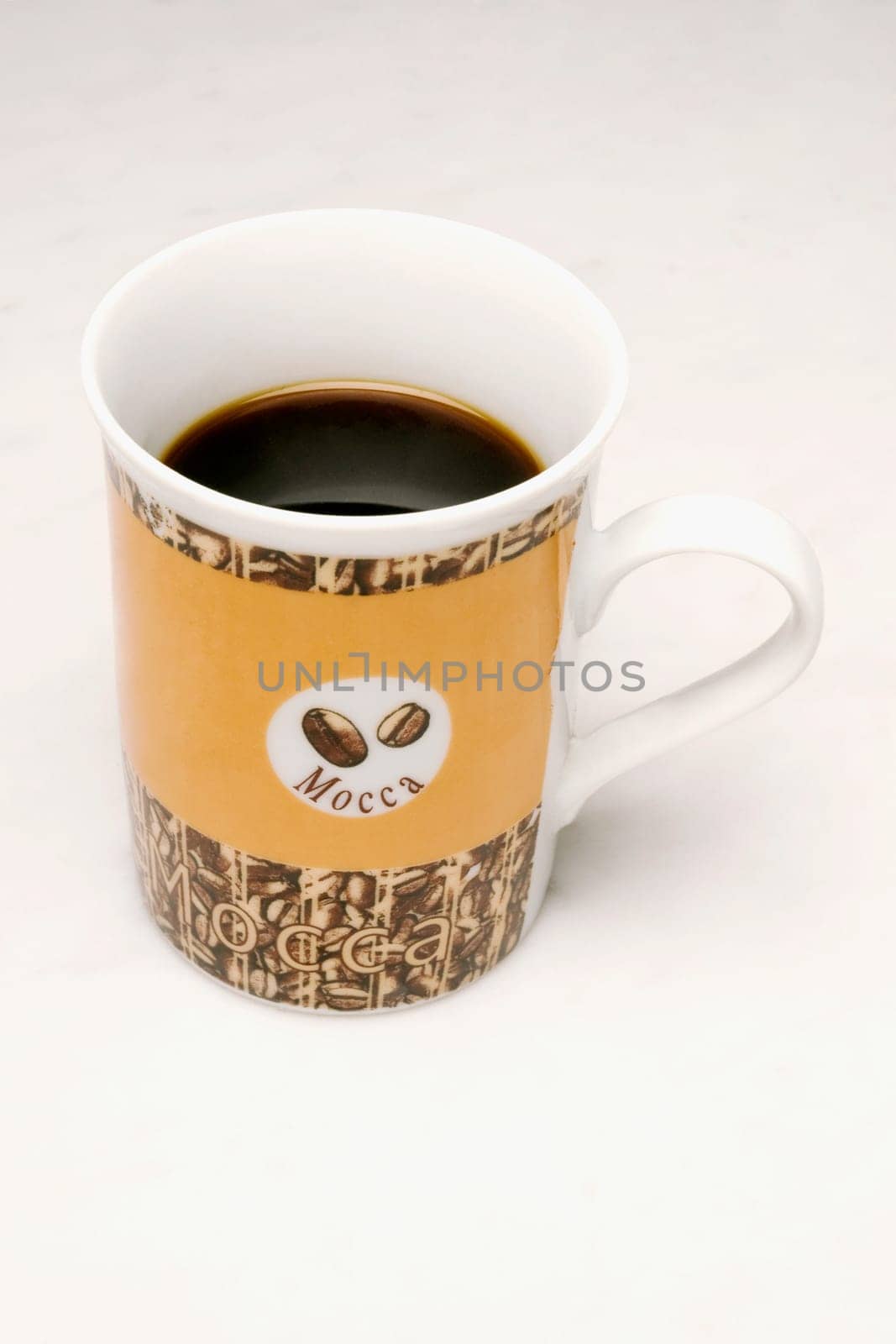 Close_up of a cup of black coffee