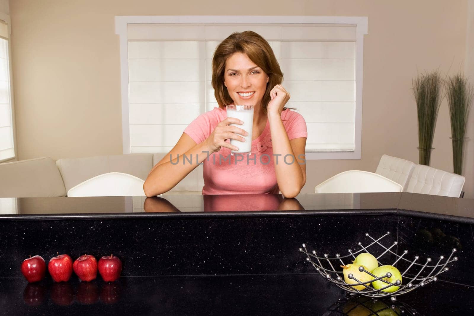 Woman drinking milk from a glass