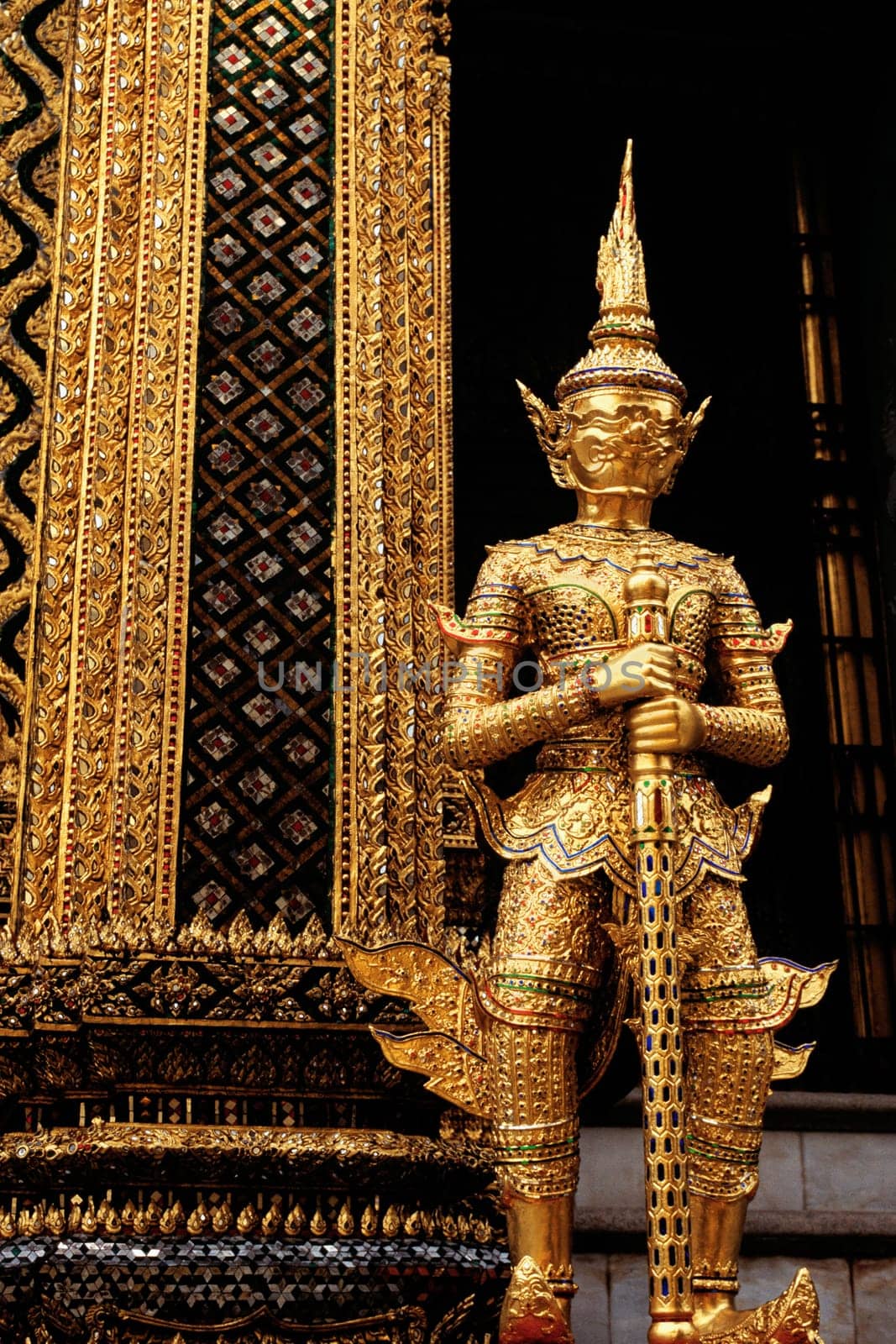 Statue in front of a temple, Wat Phra Kaeo, Grand Palace, Bangkok, Thailand